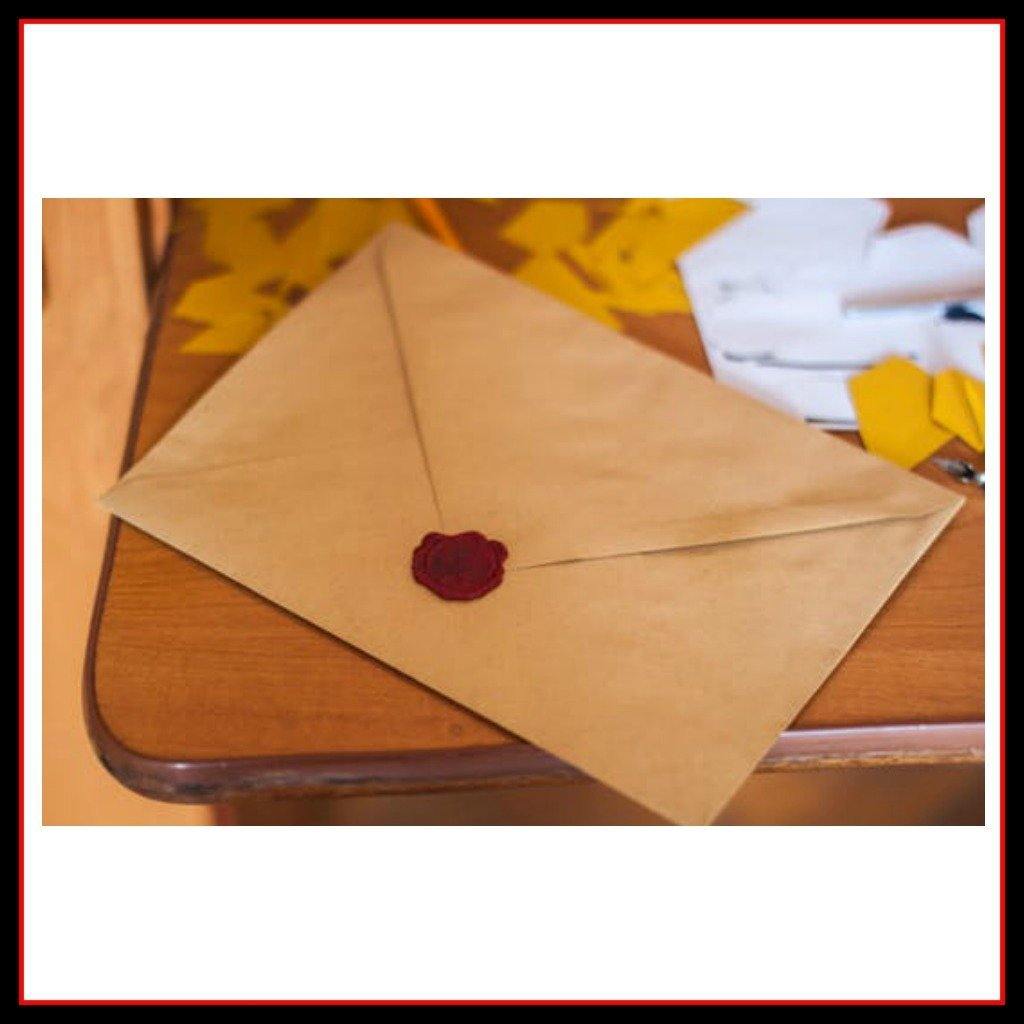 Photo of a 'sealed' envelope containing a Greeting Card