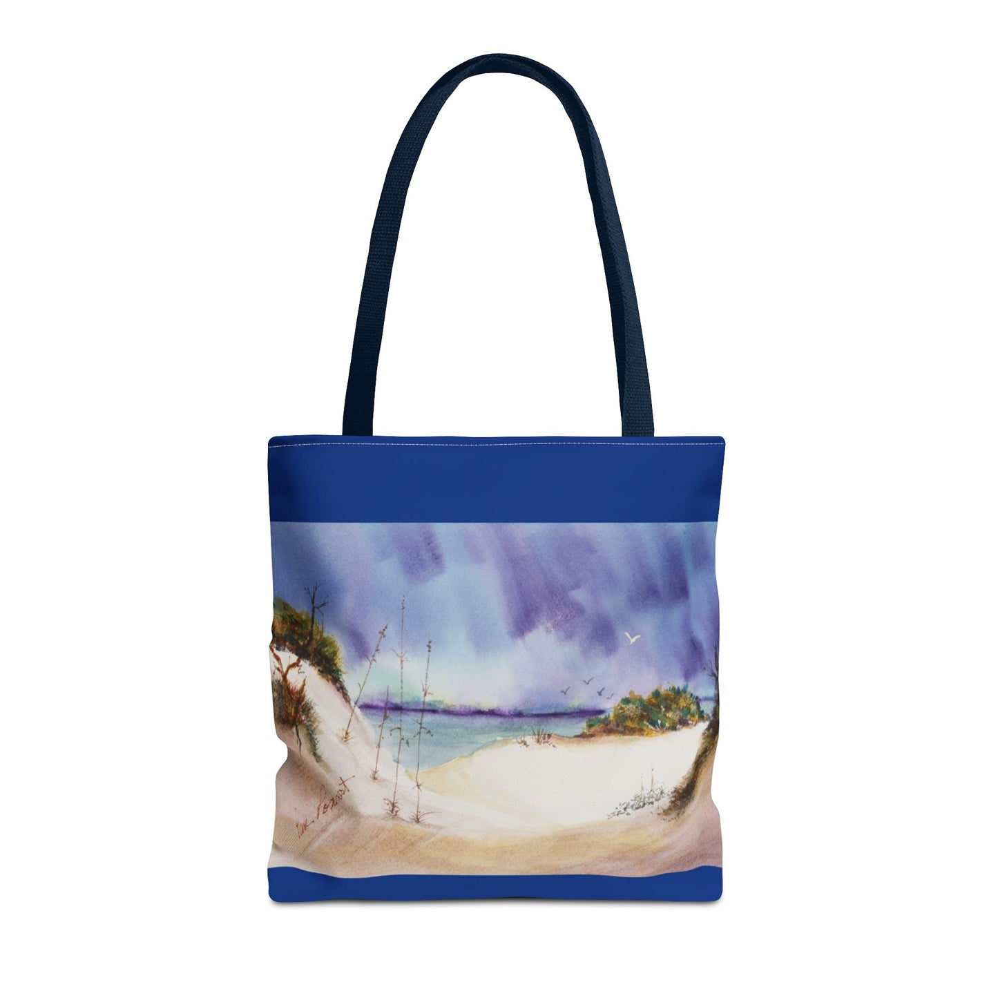 The Seaside Tote Bag from Printify features a vibrant beach scene with sand dunes, grass, and a sky with clouds and a rainbow. Made from polyester with a 2-sided print, it's perfect for summer adventures and beach outings and is available in three sizes.