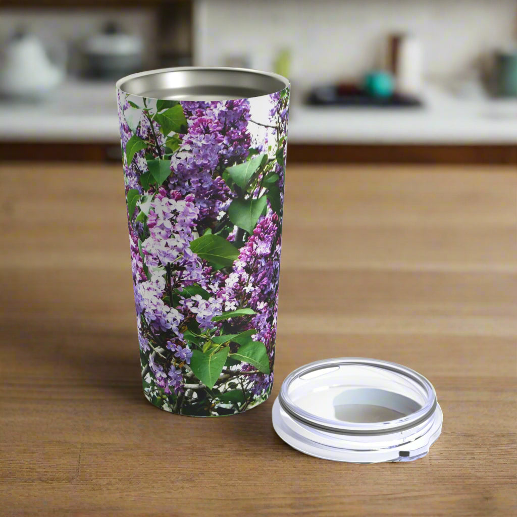 Purple Lilacs Tumbler by Printify, featuring stainless steel construction.