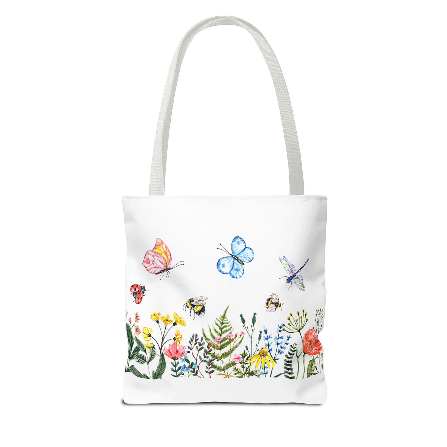 The Spring Garden Tote Bag by Printify, available in 3 sizes and made of polyester with a vibrant 2-sided print featuring butterflies, bees, and flowers, is perfect for carrying essentials during outdoor activities.