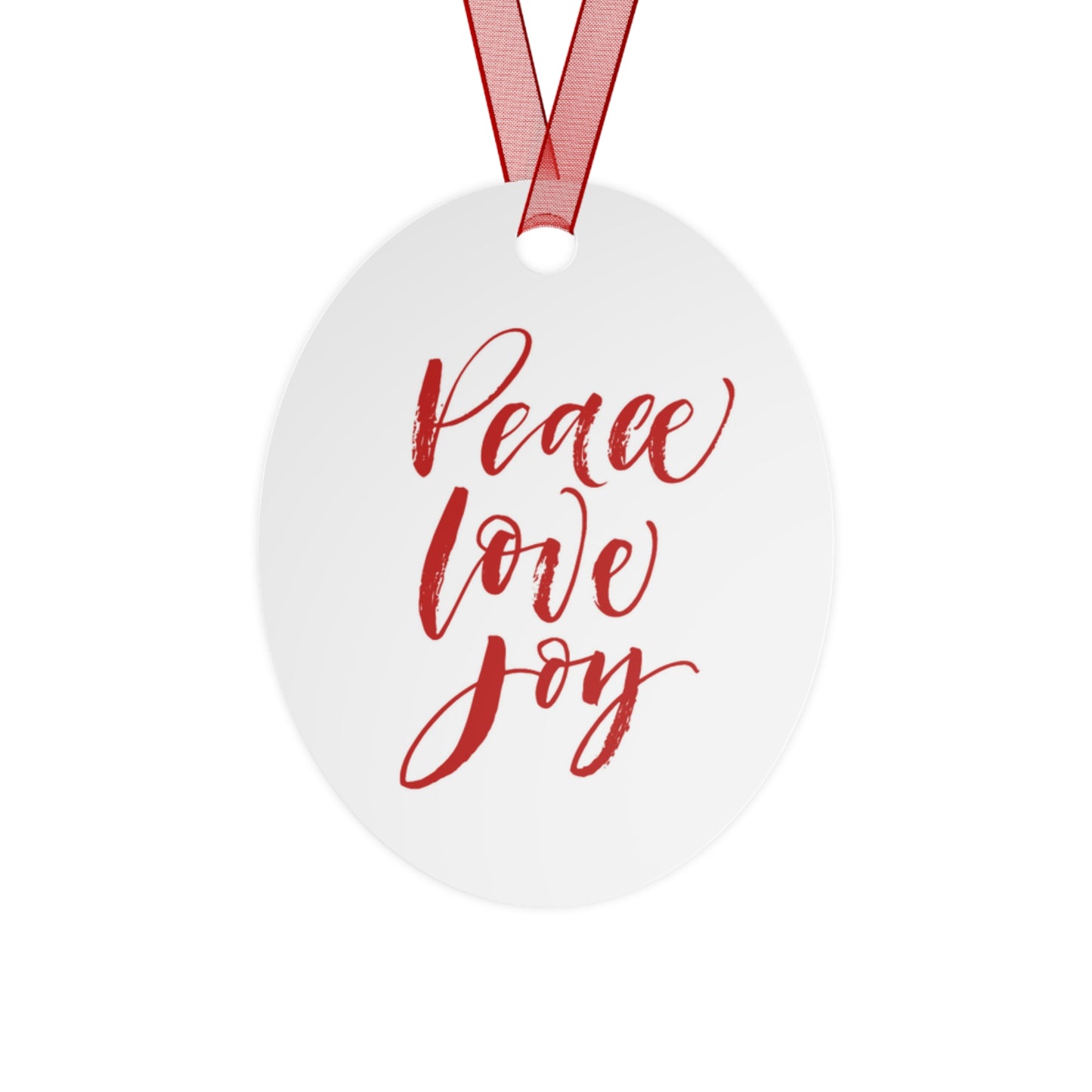 Holiday decor at its finest: the Holiday-Text Metal Ornament by Printify, featuring an oval design with a festive red hanging ribbon. Elegantly inscribed with "Peace Love Joy" in vibrant red script, this Christmas tree decoration adds a touch of warmth and charm to any festive setting.