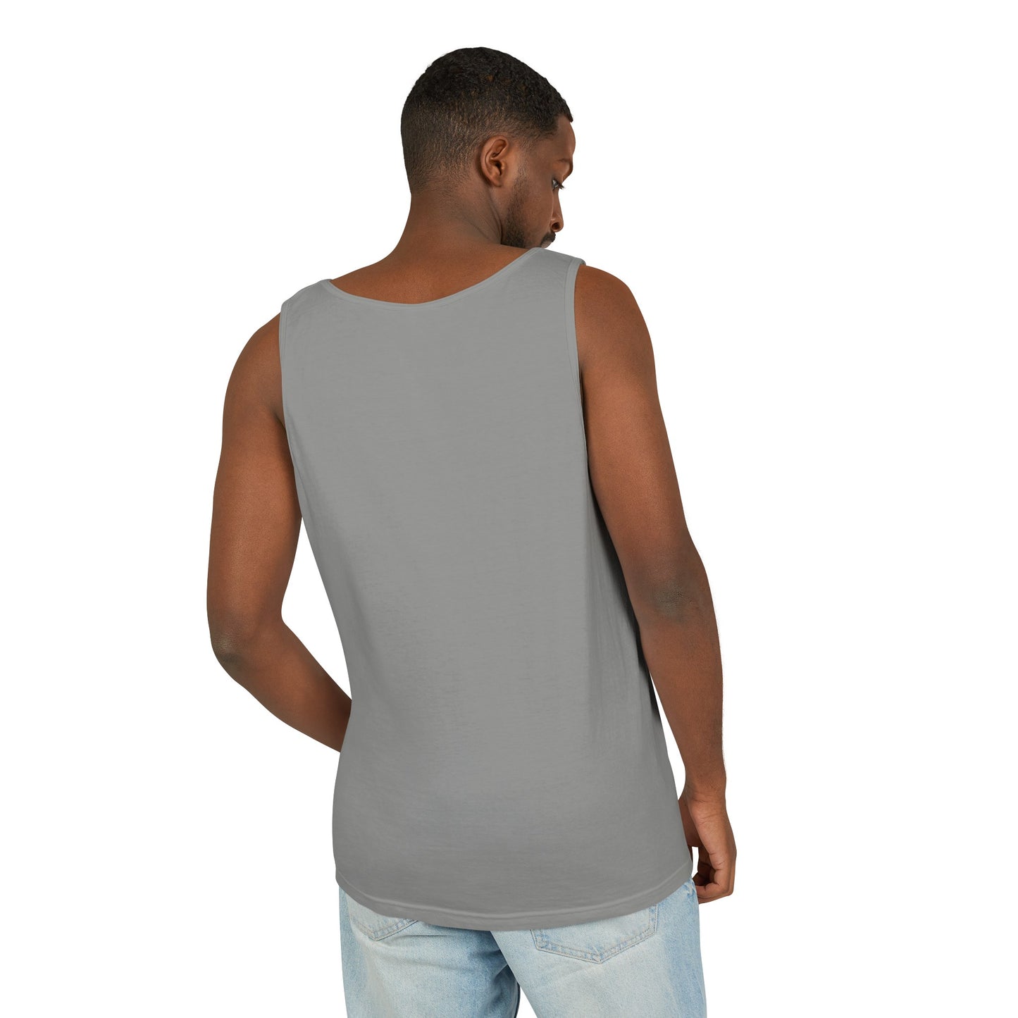 A man is standing with his back to the camera, wearing a gray sleeveless Unisex Patriotic Tank-top: One color; Cotton; Relaxed-fit from Printify and blue jeans.