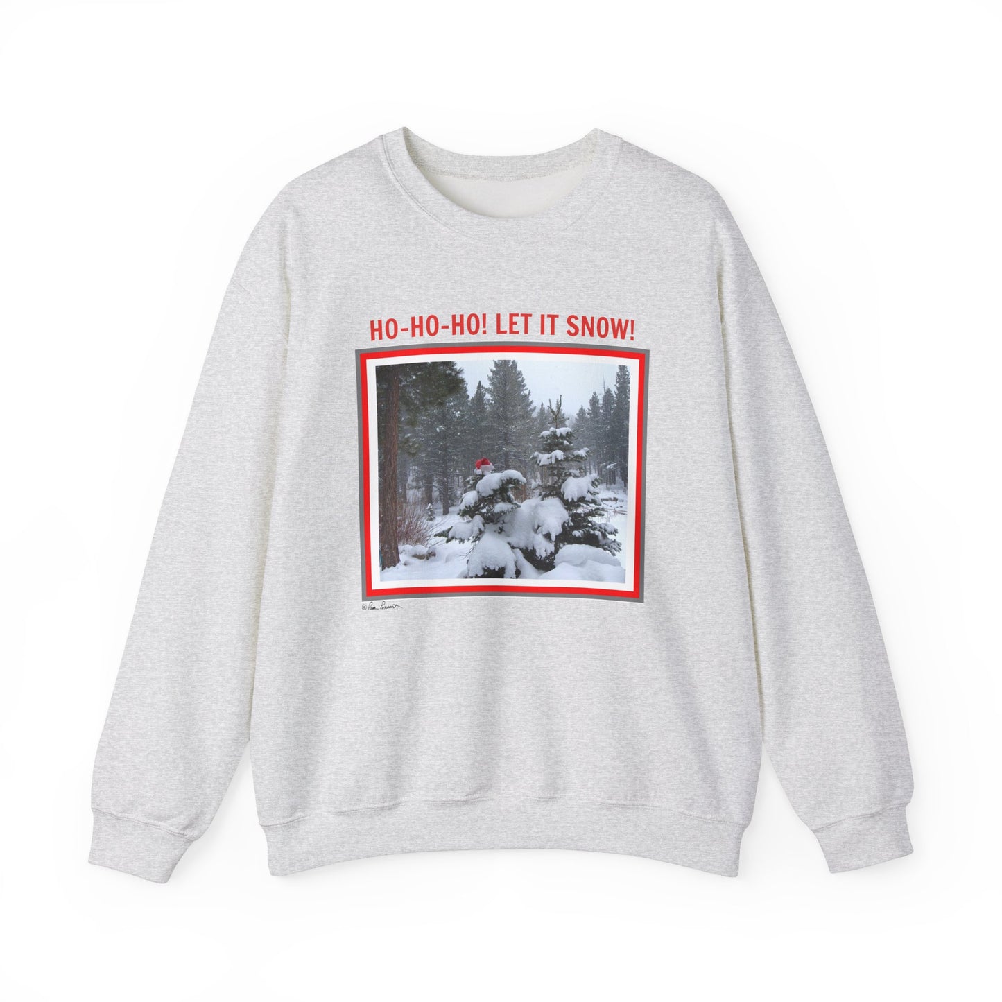 The Unisex Holiday Crewneck Sweatshirt: Heavy Blend™ by Printify is a cozy essential, featuring a gray design with a snow-covered forest and red border, along with "HO-HO-HO! LET IT SNOW!" text. Ideal for sustainable fashion seekers, it embodies the festive spirit.