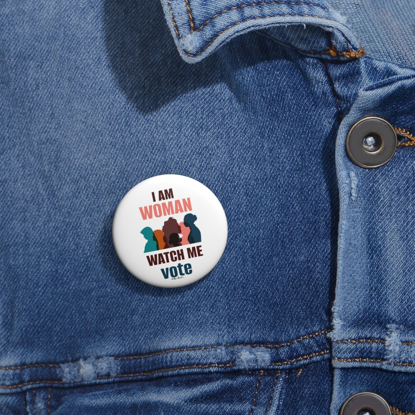 1.25" button on a denim shirt