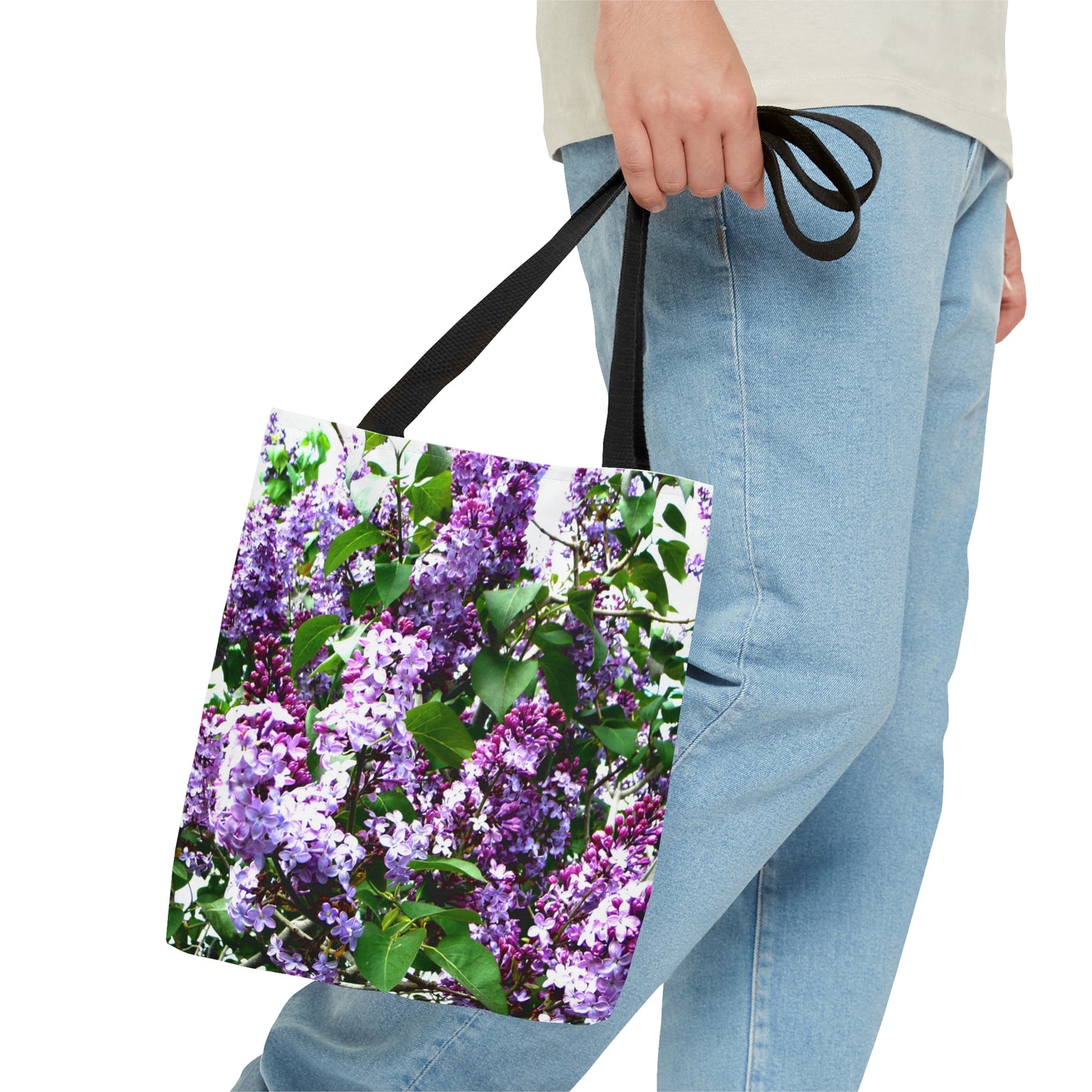 Man carrying small tote bag