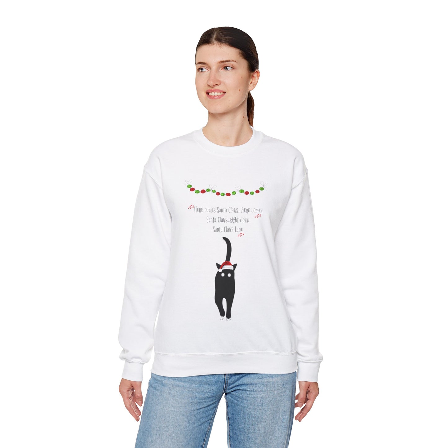 A person is wearing a comfortable medium-heavy fabric sweatshirt featuring a black cat illustration and festive "Santa Claws Sweatshirt" text, from Printify's Gildan unisex collection available in three colors.