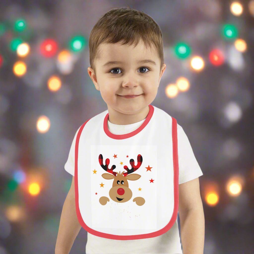 Smiling baby wearing bib