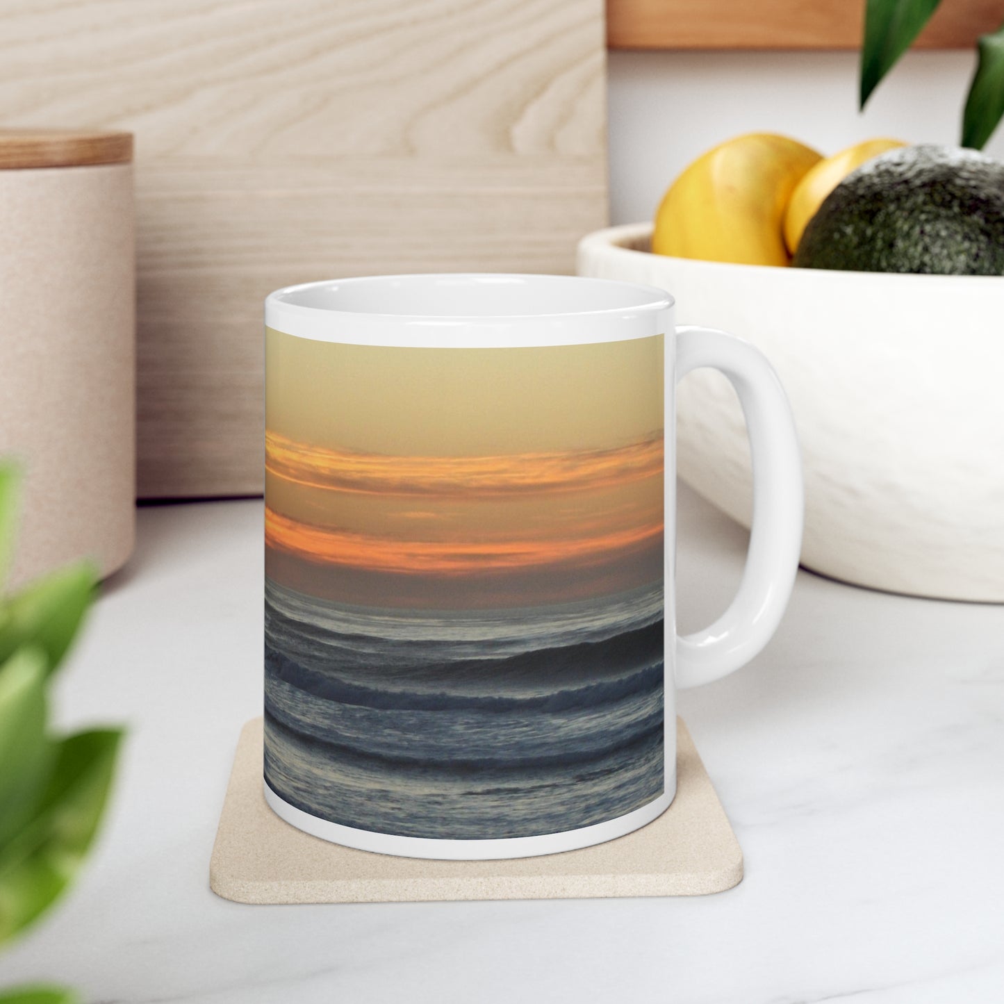 Mock up of the right side of the mug on a coaster in a kitchen