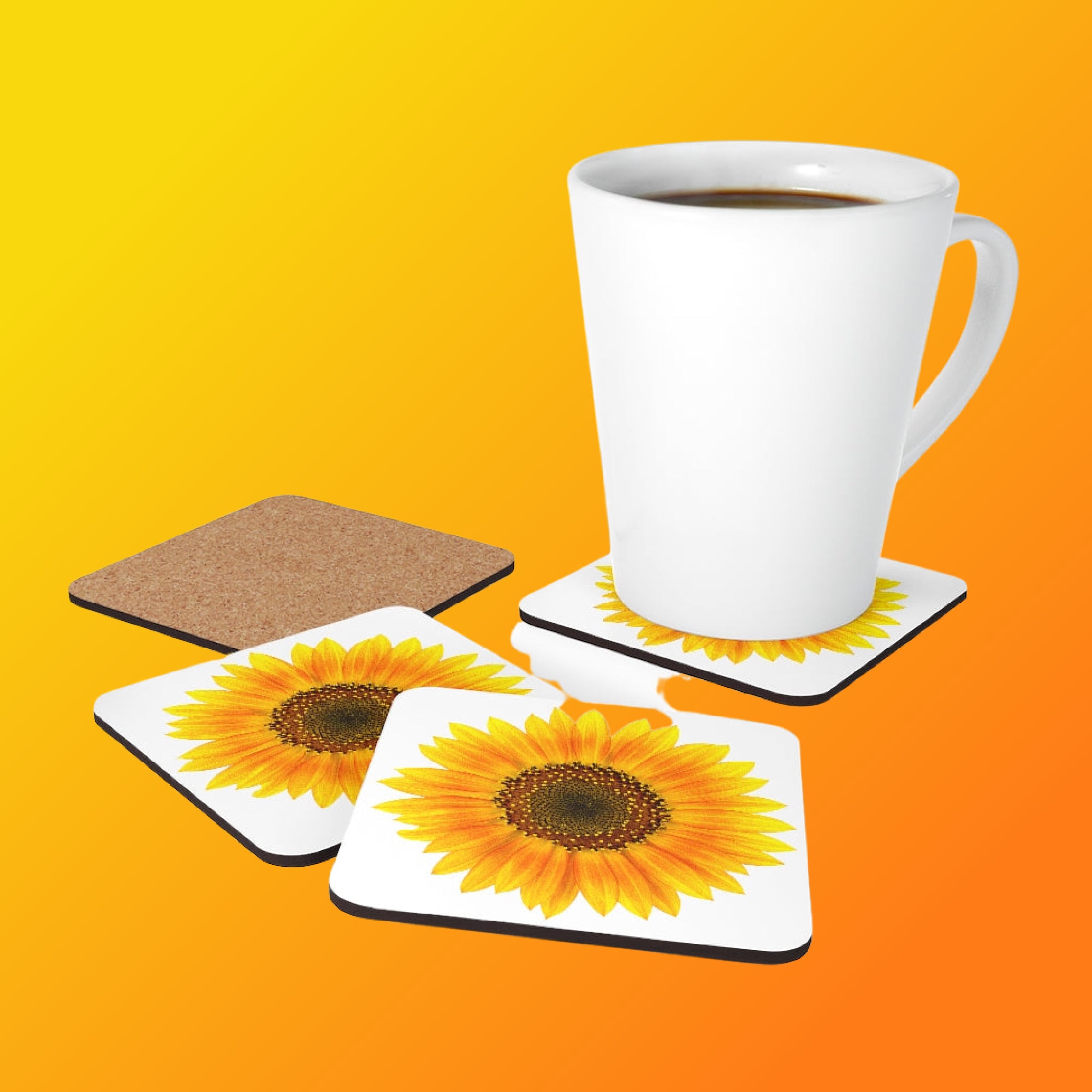 Photo of 3 coasters "face-up" showing a yellow Sunflower with a white latte mug and one coaster "face-down" showing the cork backing