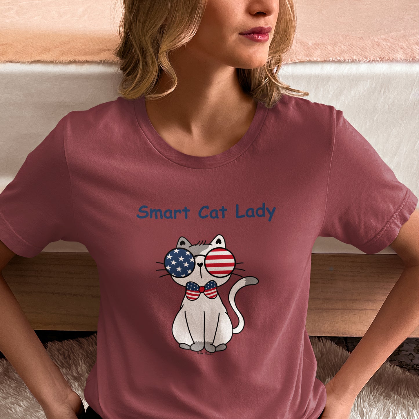 Woman wearing the mauve colored T-shirt