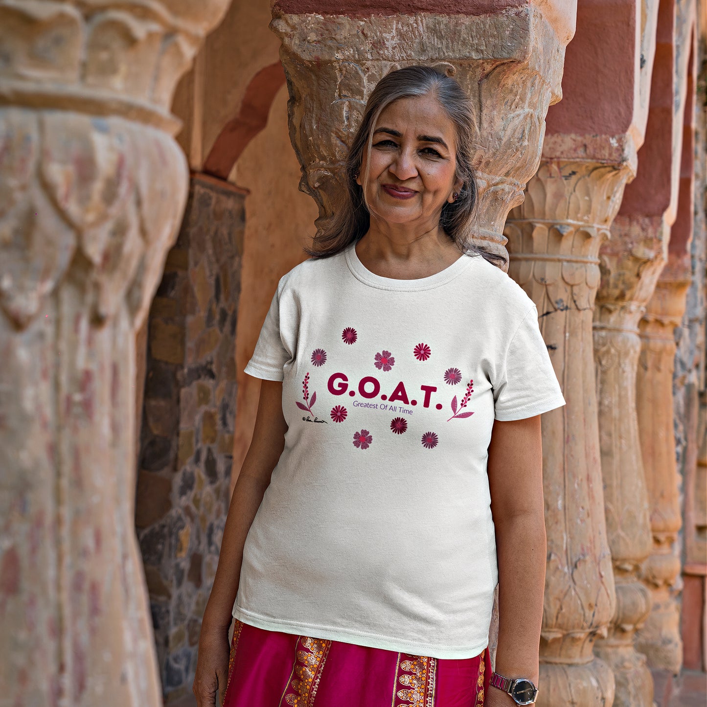 Mock up of a older woman wearing the Greatest Of All Time T-shirt
