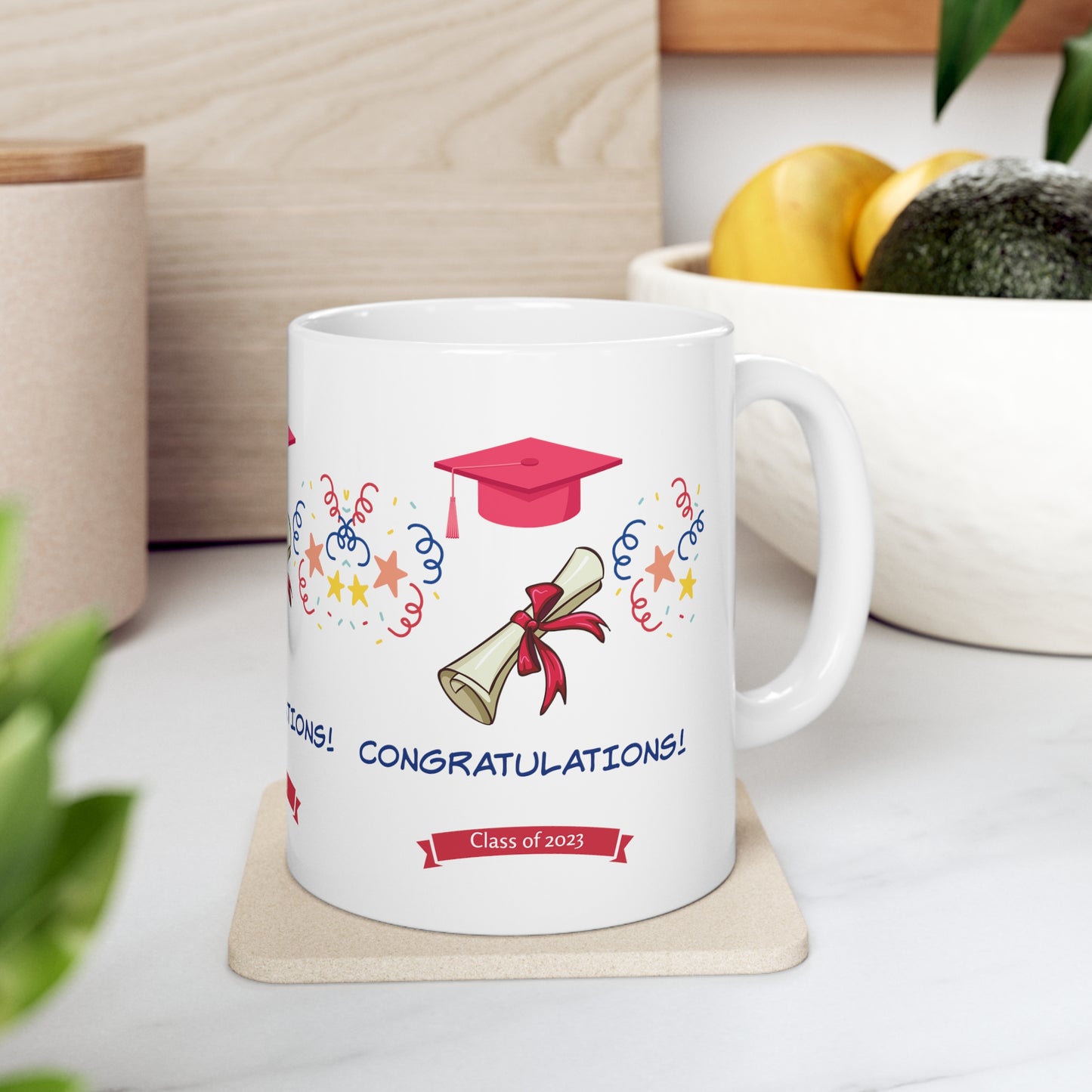 Mock up of the right side of the mug sitting on a coaster near a bowl of fruit