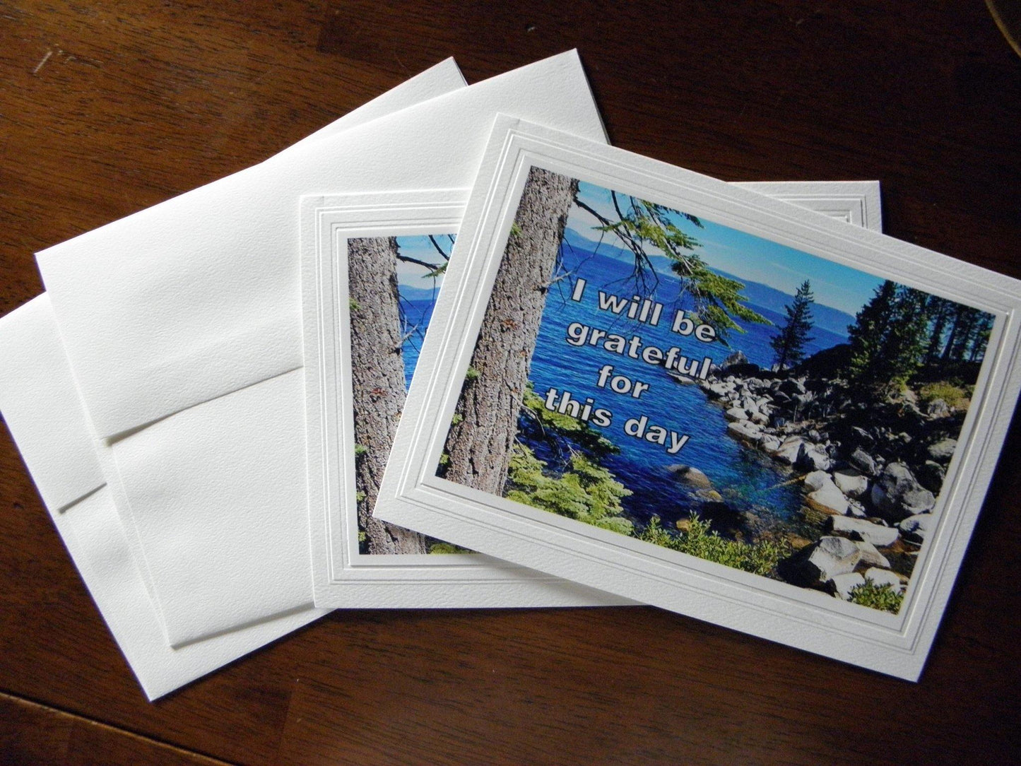 Photo of the card with text which reads "I will be grateful for this day" printed in block letters across the middle of the image