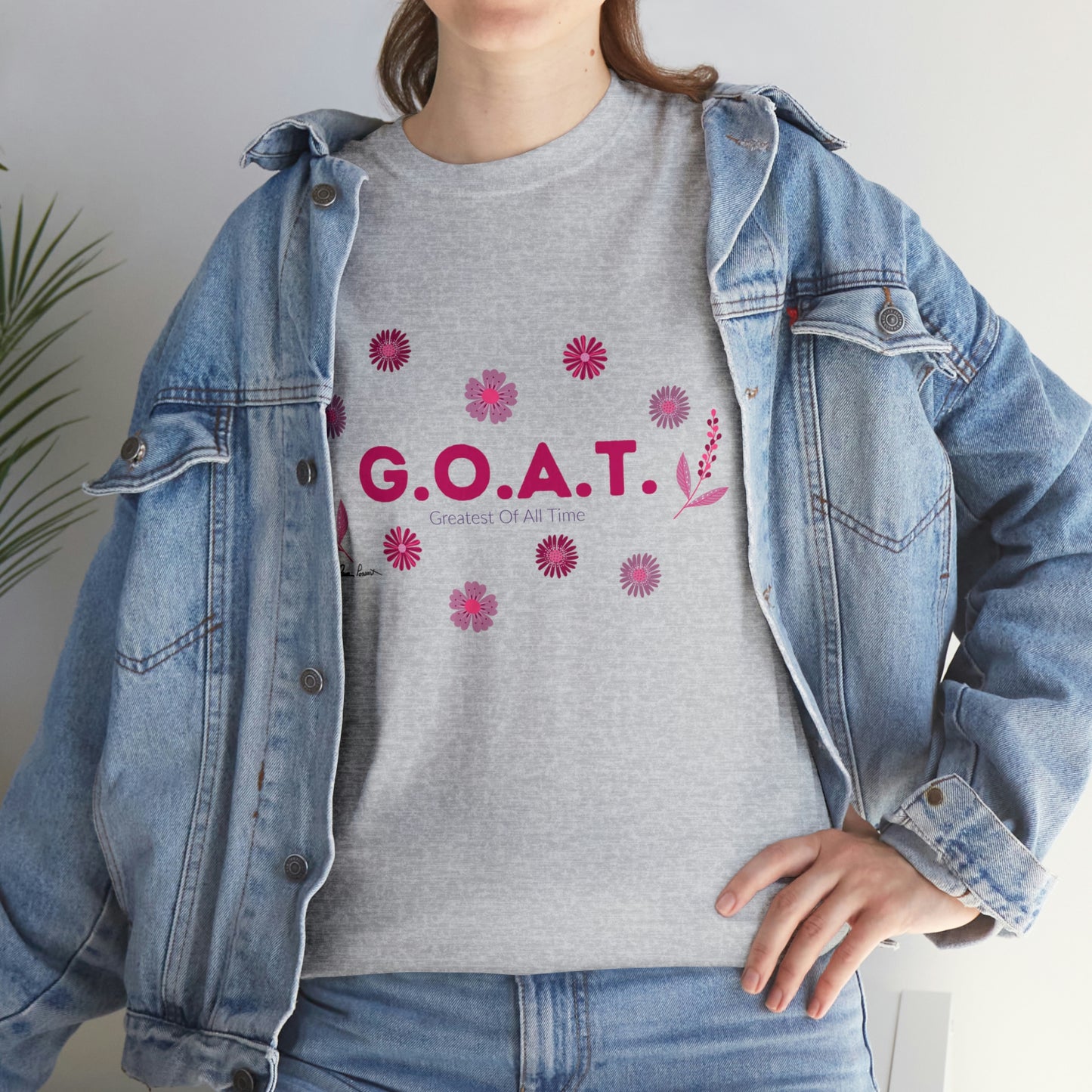 Mock up of a woman wearing the grey t-shirt under a denim jacket