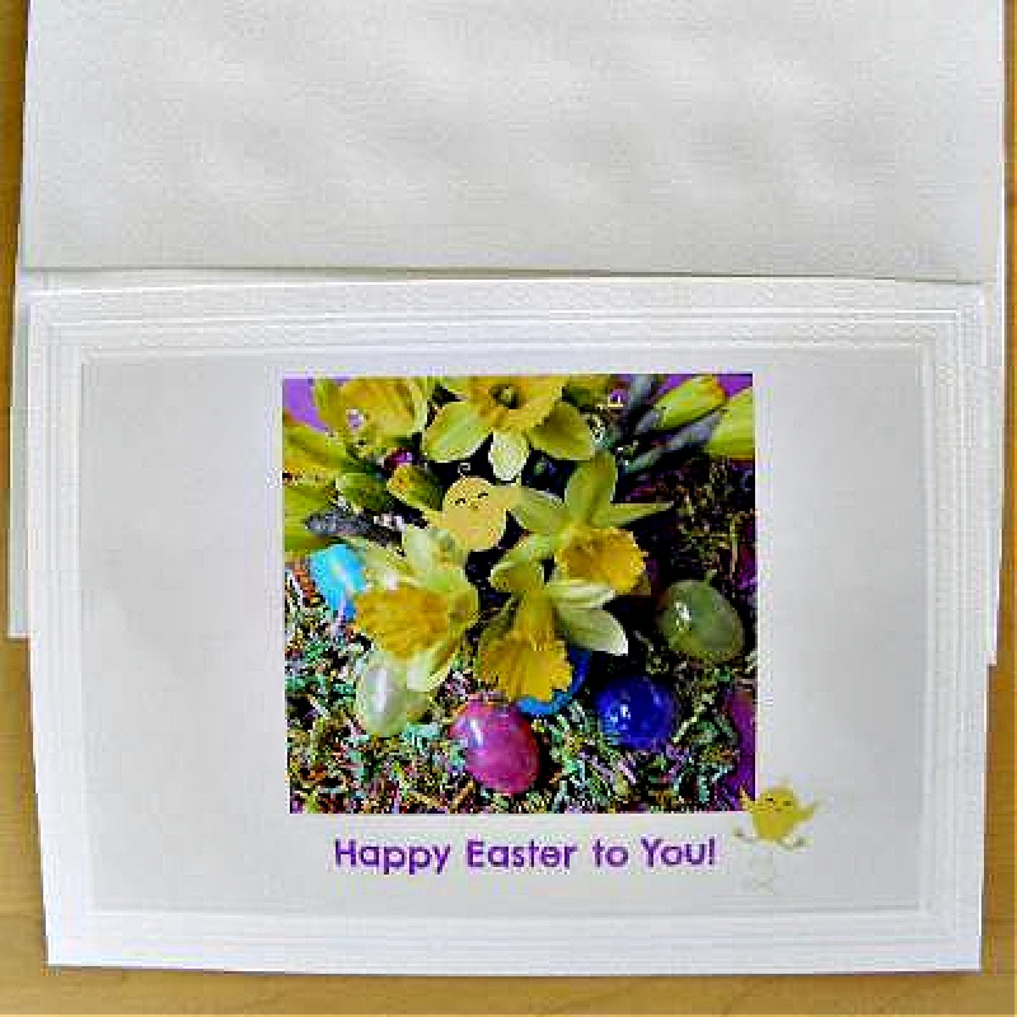 Front view of the card on the actual deluxe embossed Classic card stock and the envelope