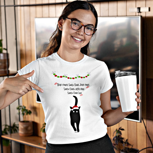 Mock up of a woman with a beverage and who is pointing to the design on our white slim-fit t-shirt
