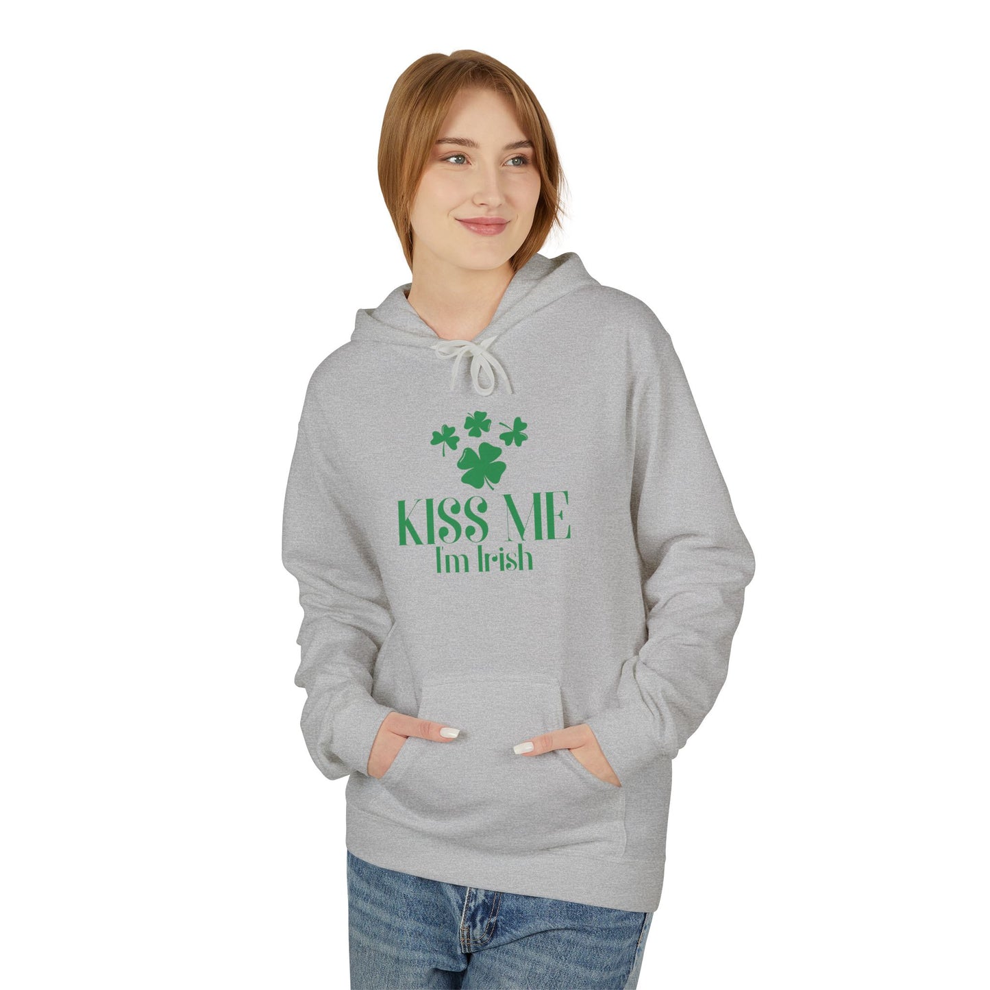 A person wears the Printify Kiss-Me I'm Irish Hoodie: St. Patricks Day Shamrock Pullover, featuring green shamrocks and "Kiss Me I’m Irish" text—a festive way to show off your Irish pride this St. Patrick’s Day.