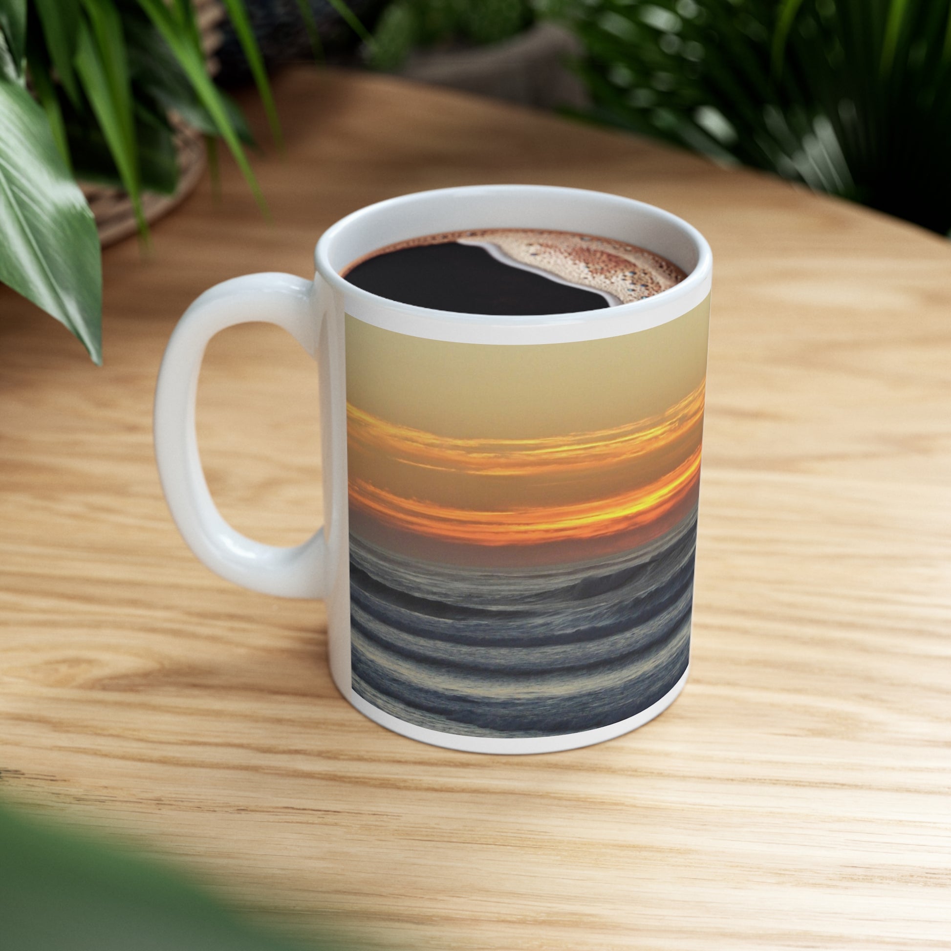Mock up of mug filled with beverage sitting on a wooden surface