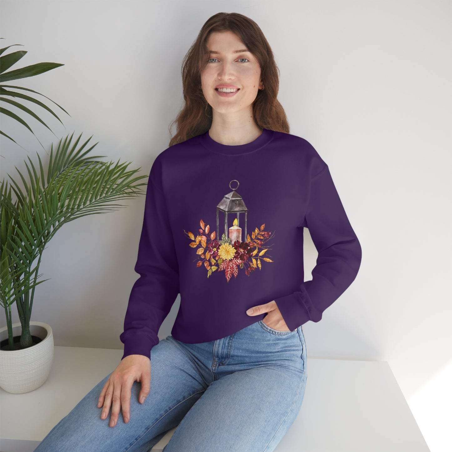 Mock up of a woman sitting on a surface while wearing the Purple shirt