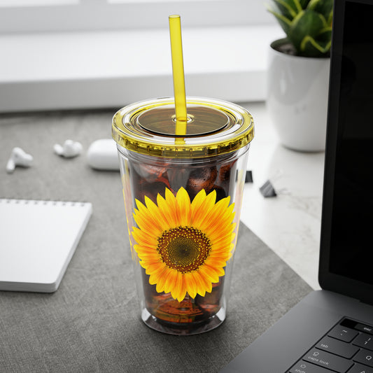 Corrected Sentence: A Printify Golden Sunflower Tumbler: 16 oz.; With straw & lid; Acrylic sitting on a desk.