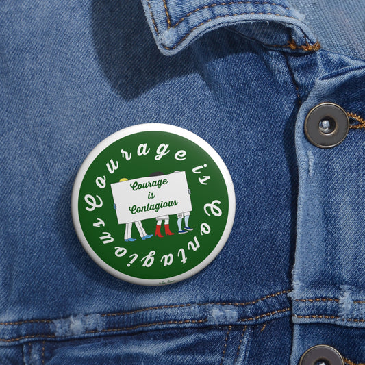 Button with 'Courage is Contagious' text on a denim jacket
