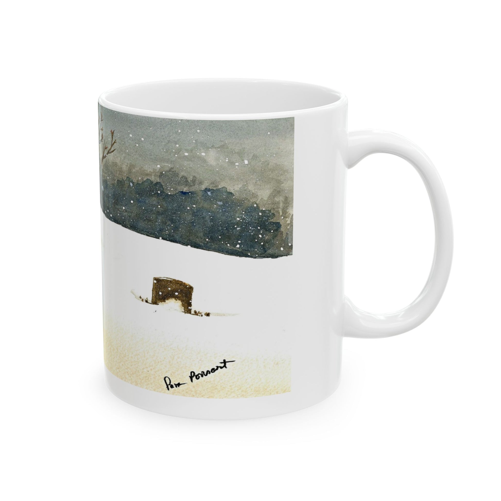 The Printify Winter Wonderland Mug, an 11 oz. ceramic piece, features a serene winter landscape with snow and trees in stunning watercolor art. Elegantly signed by artist Pam Ponsart near the bottom, this exquisite mug brings the tranquility of a snowy scene to your morning routine.