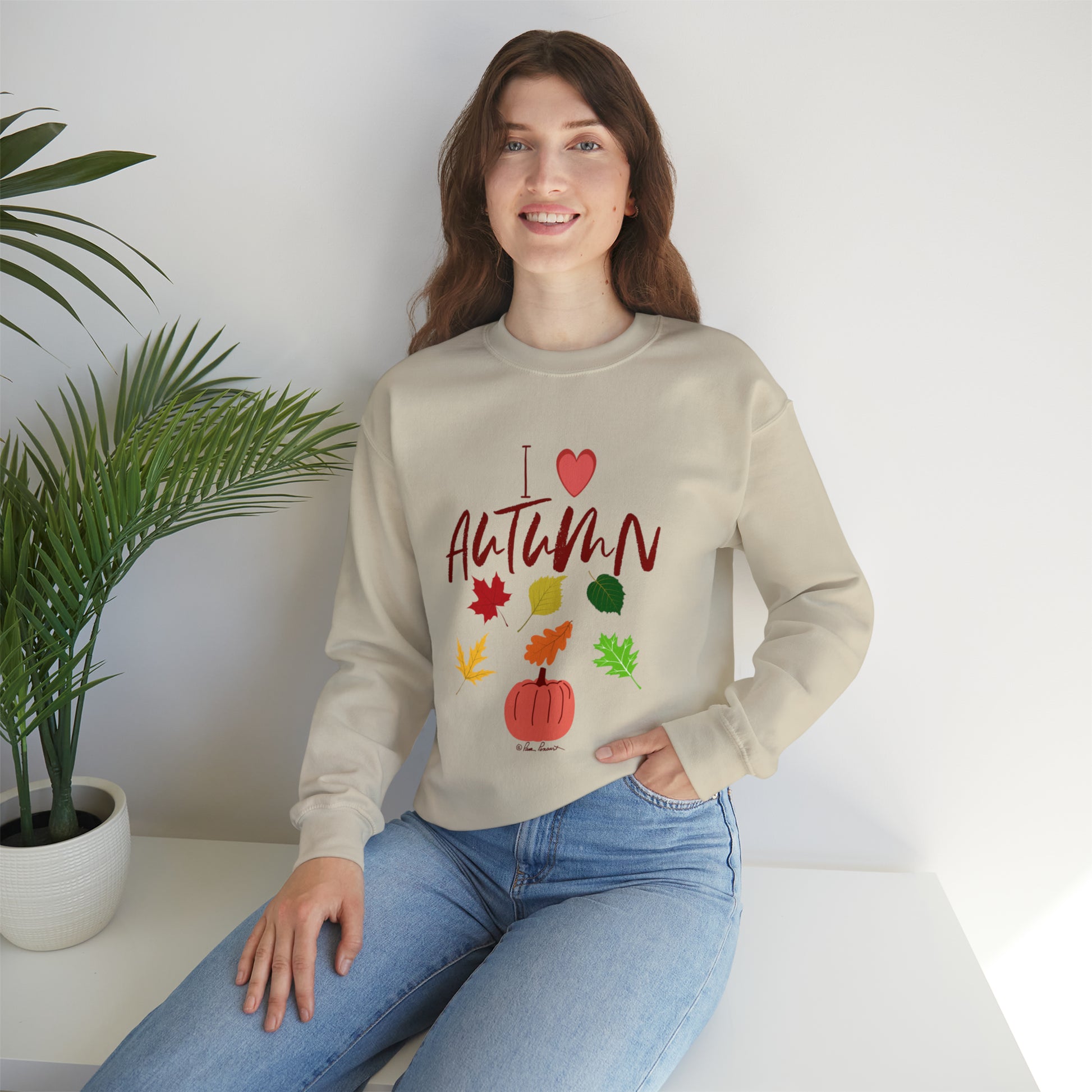 Mock up of a dark-haired woman wearing the Sand sweatshirt