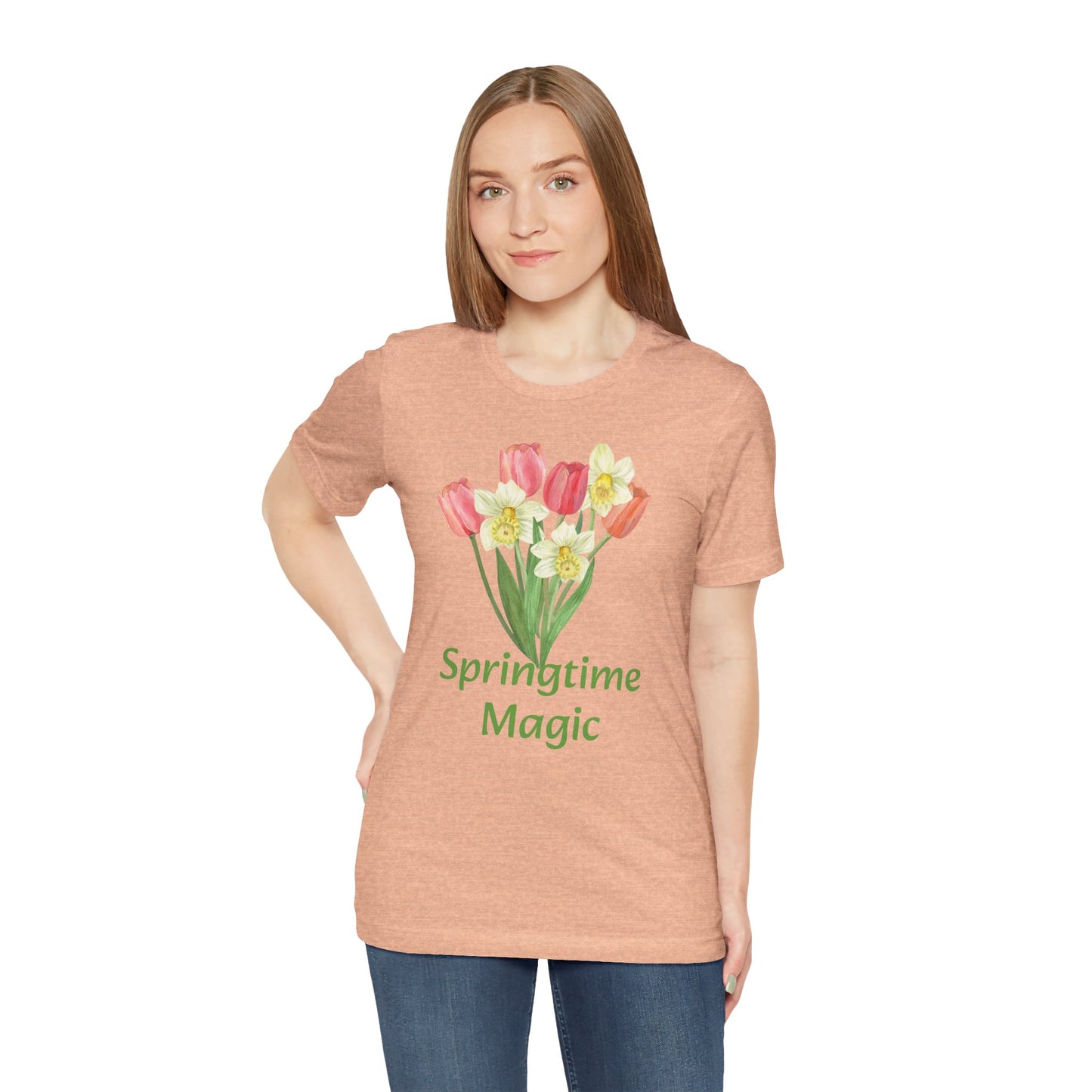 Woman wearing a Unisex Springtime-Magic T-shirt with a floral design and the words "springtime magic" by Bella + Canvas from Printify.