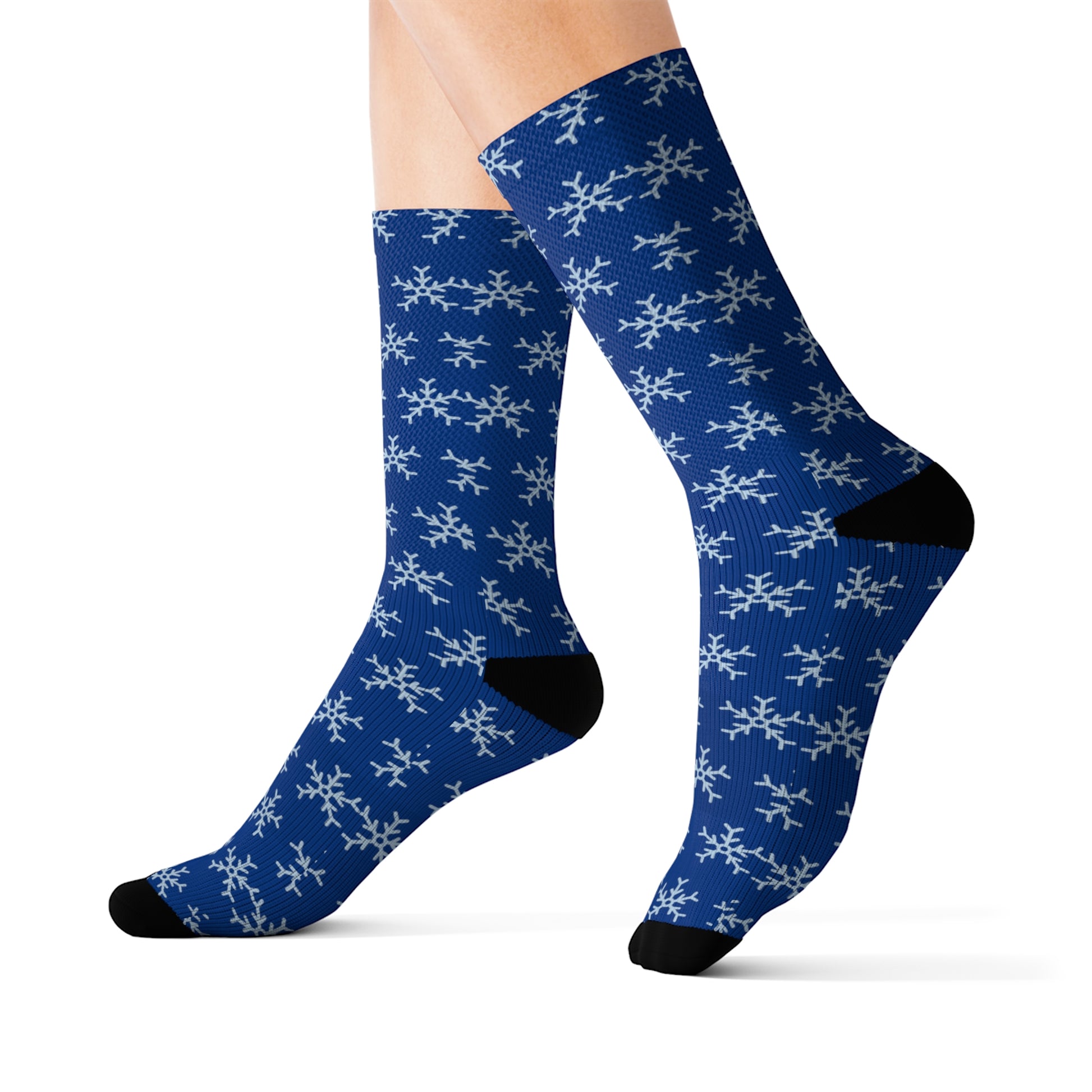 A pair of Printify blue tube socks with snowflakes.