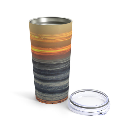 A Printify Sunset Seascape Tumbler: 20 oz.; Stainless steel; Insulated with a picture of a sunset.