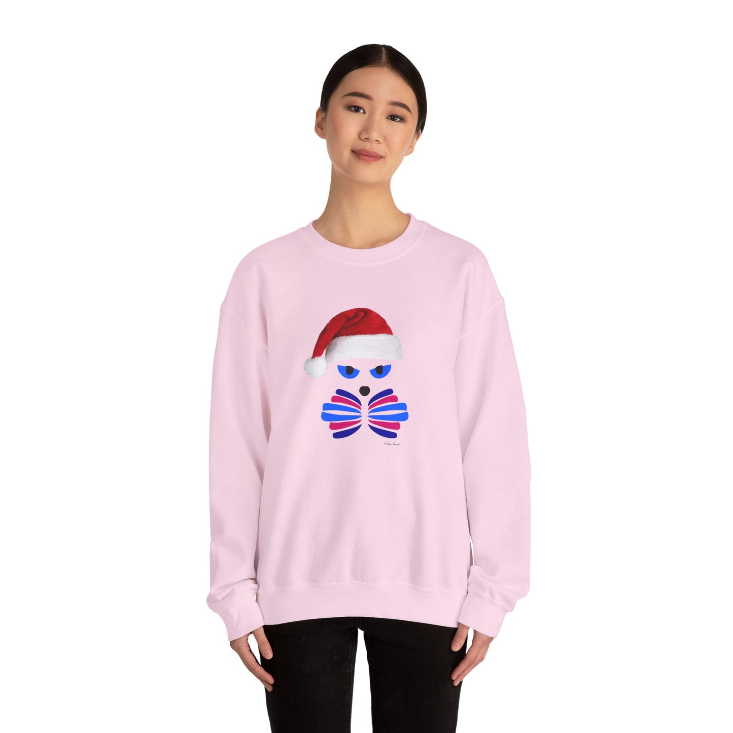 A person wears the Printify Santa Cat Sweatshirt—a unisex, festive crewneck with a cat in a Santa hat graphic—standing against a plain white background.