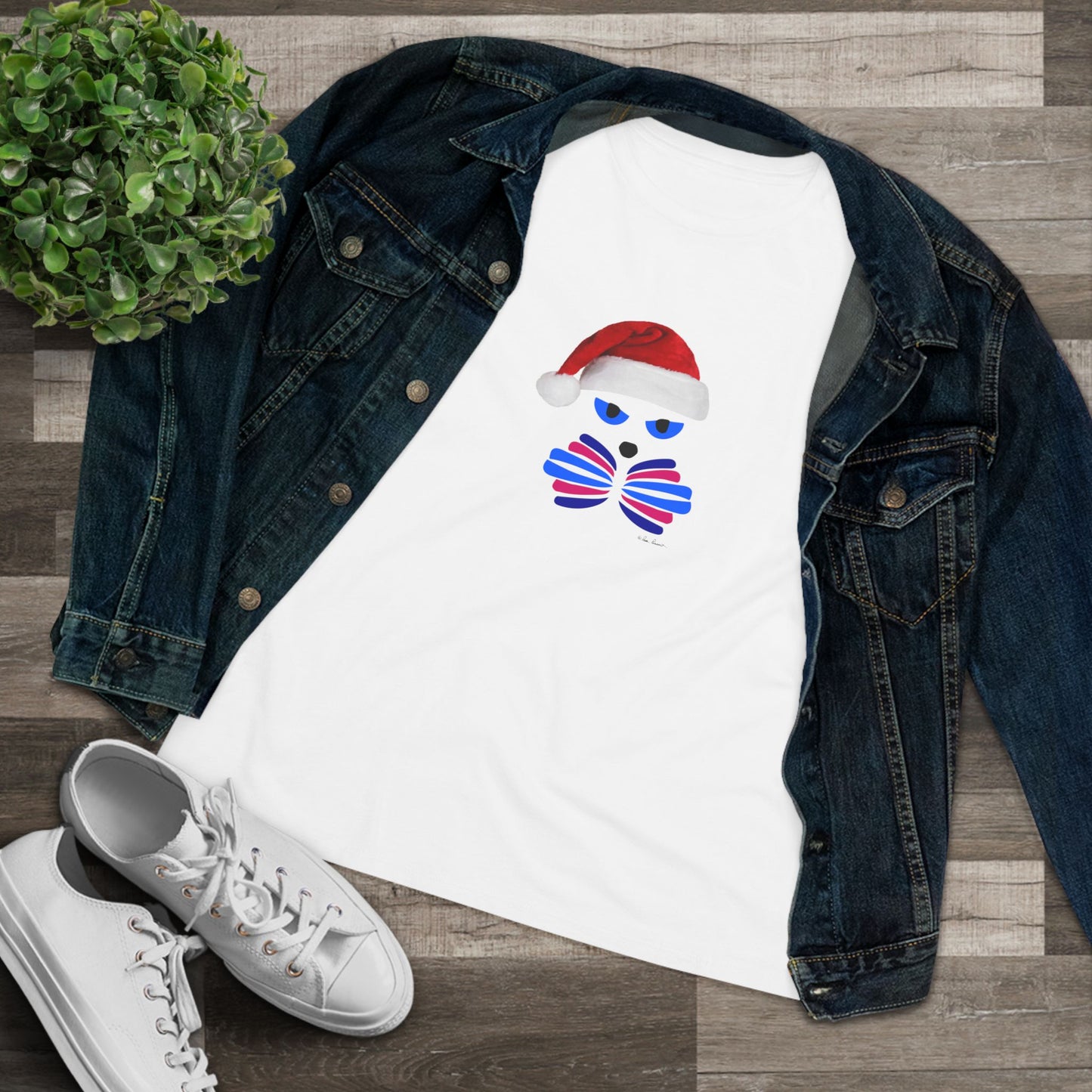 The Festive Women's Santa-Cat T-shirt by Printify is a cute cotton tee featuring a cat in a Santa hat and bowtie—available in 2 colors, it's perfect for holiday looks.