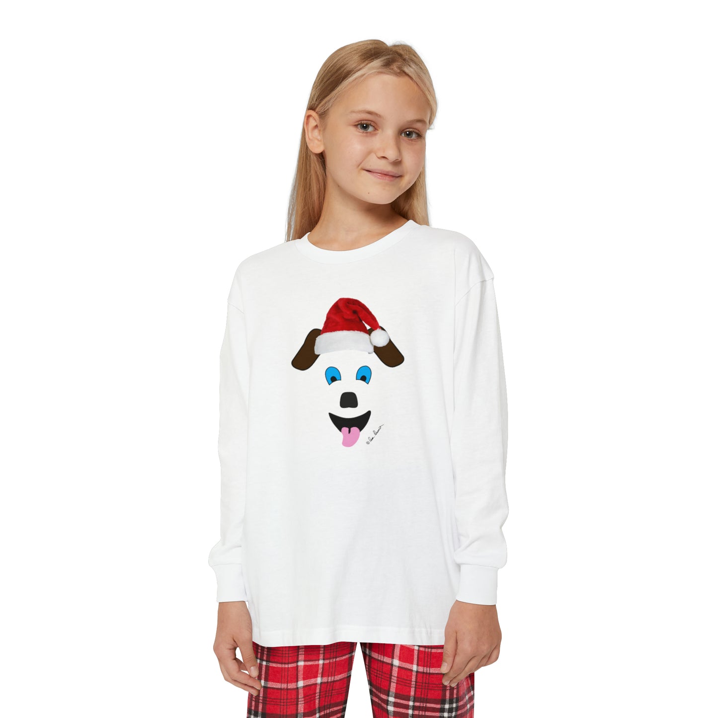 A girl in a custom Santa Claus t-shirt and Printify Youth Long-Sleeve Pajama Set. Made with 100% cotton.
