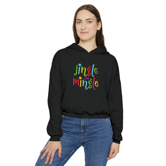 A woman wearing a Bella + Canvas women's cinched-bottom hoodie in black that says jingle and mingle from Printify.