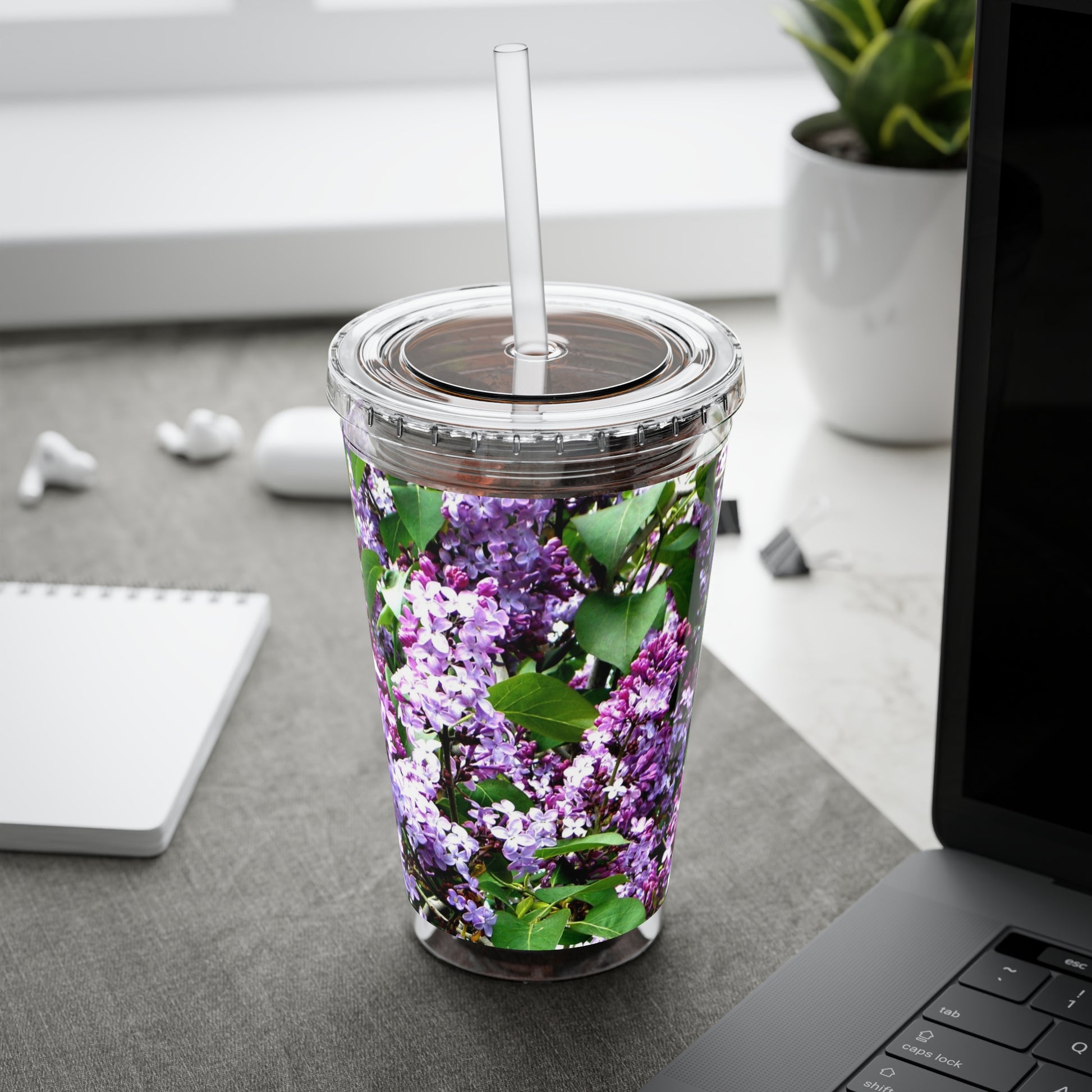 A Printify Purple Lilacs Tumbler with a straw and a purple lilacs design on it.