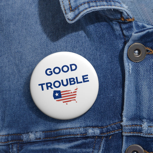 The Printify Lightweight Pin Button, available in 2 sizes, features "GOOD TROUBLE" above a U.S. outline with stars and stripes—a civil rights-inspired design—perfect for pinning to your jacket.