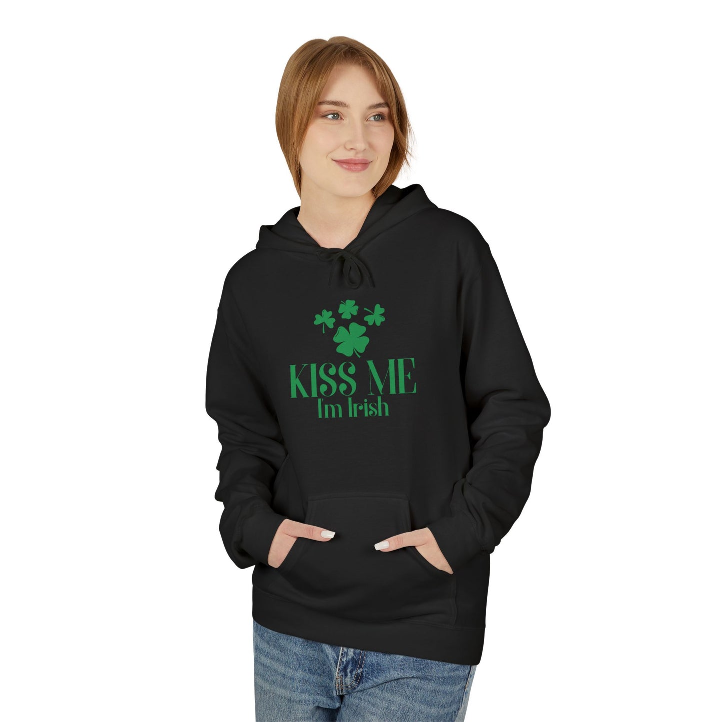 A person models the Printify Kiss-Me I'm Irish Hoodie: St. Patricks Day Shamrock Pullover, featuring green shamrocks and bold lettering, against a white background—ideal for showing off your Irish pride on St. Patrick’s Day.