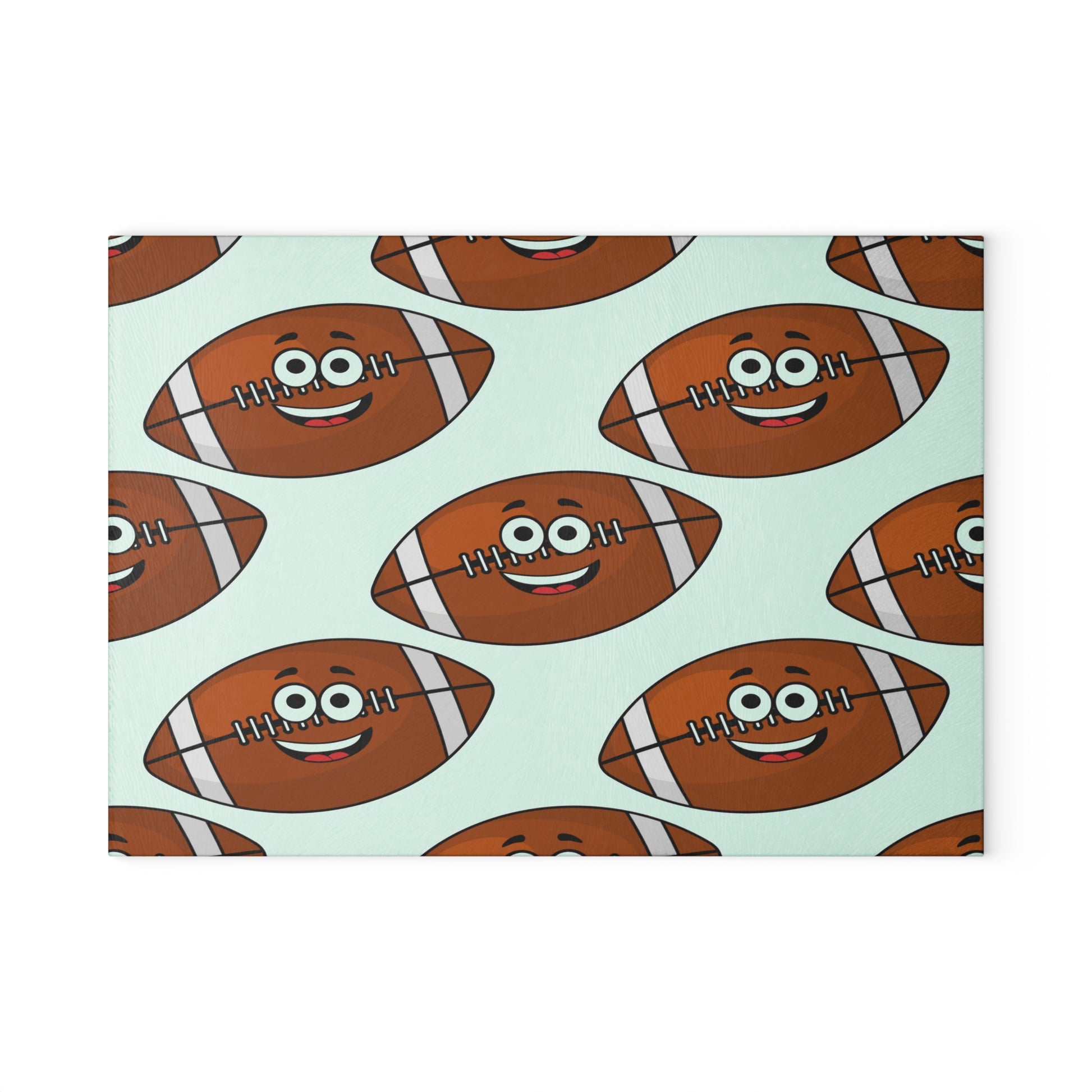 Brighten your kitchen with the Printify Playful Football-Faces Cutting Board: Glass. This fun design features cartoon footballs with smiling faces and big eyes, making meal prep playful and stylish. Available in 2 sizes.