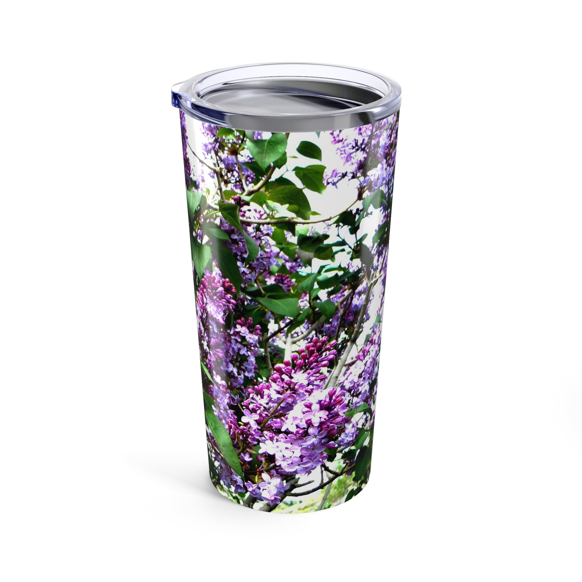 The Printify Purple Lilacs Tumbler (20 oz.) features a printed lilac and green leaf design on white, crafted from insulated stainless steel to keep drinks at the ideal temperature.