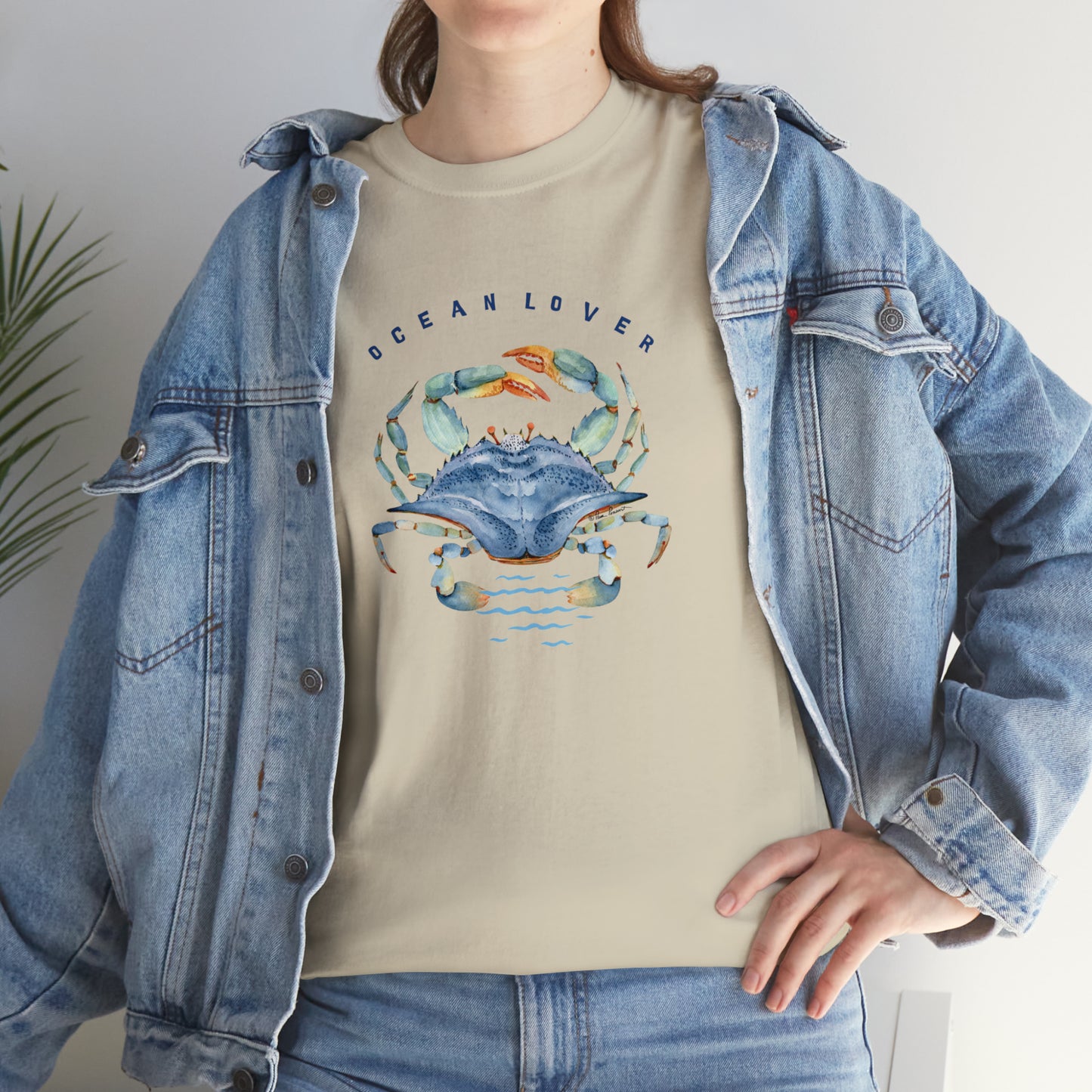 Mock up of a woman wearing the Sand-colored shirt under a denim jacket