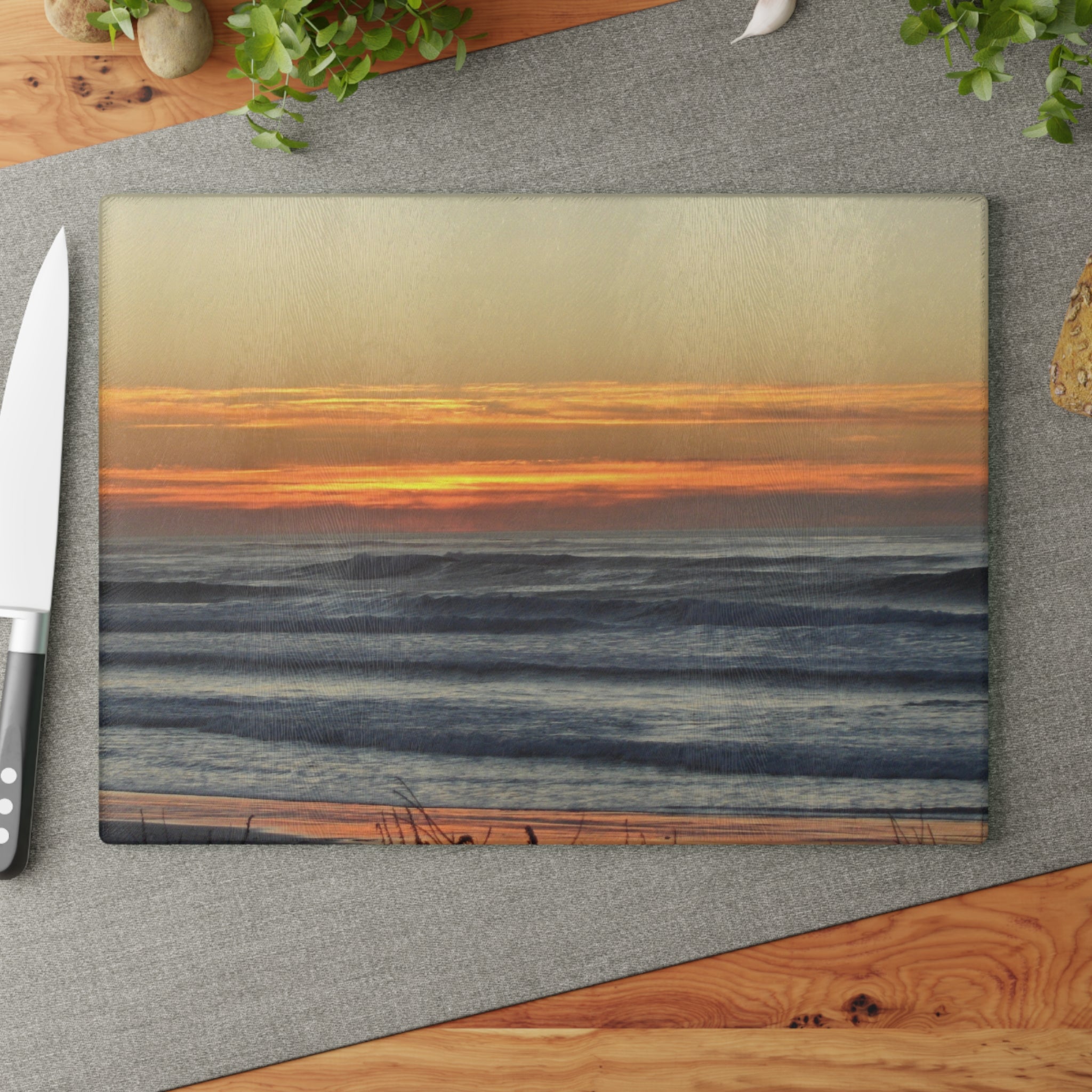 Large glass cutting board with a seascape scene