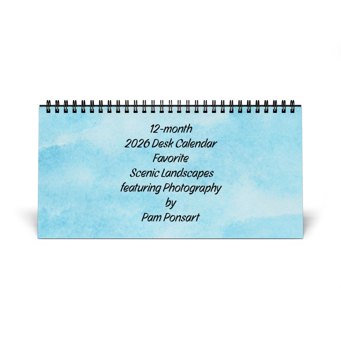 The 2026 Scenic-Landscapes Desktop Calendar: 12-Mos | Photos by Printify is a compact, spiral-bound desk calendar showcasing Pam Ponsart’s scenic landscape photography—perfect for nature lovers to enhance any workspace.