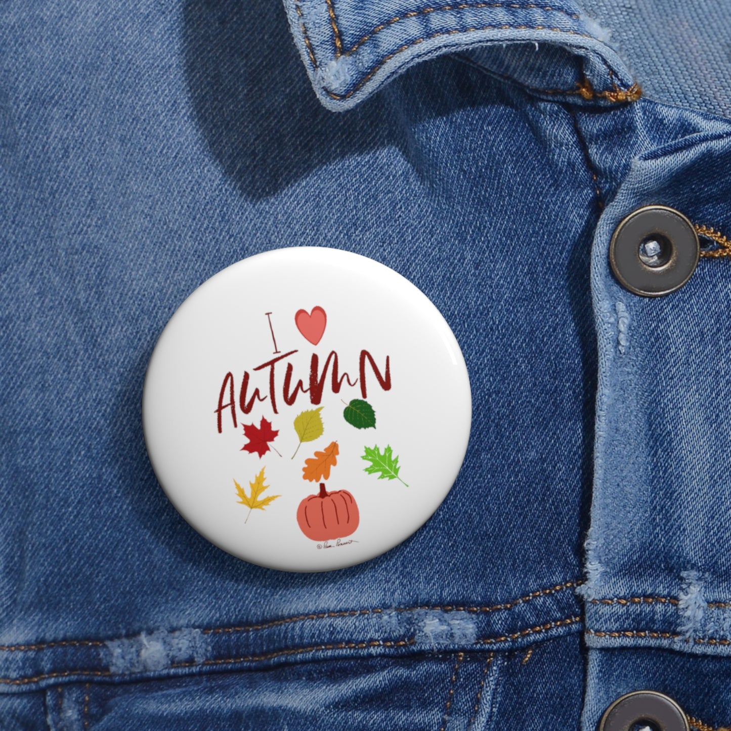 2.25" button on a denim shirt