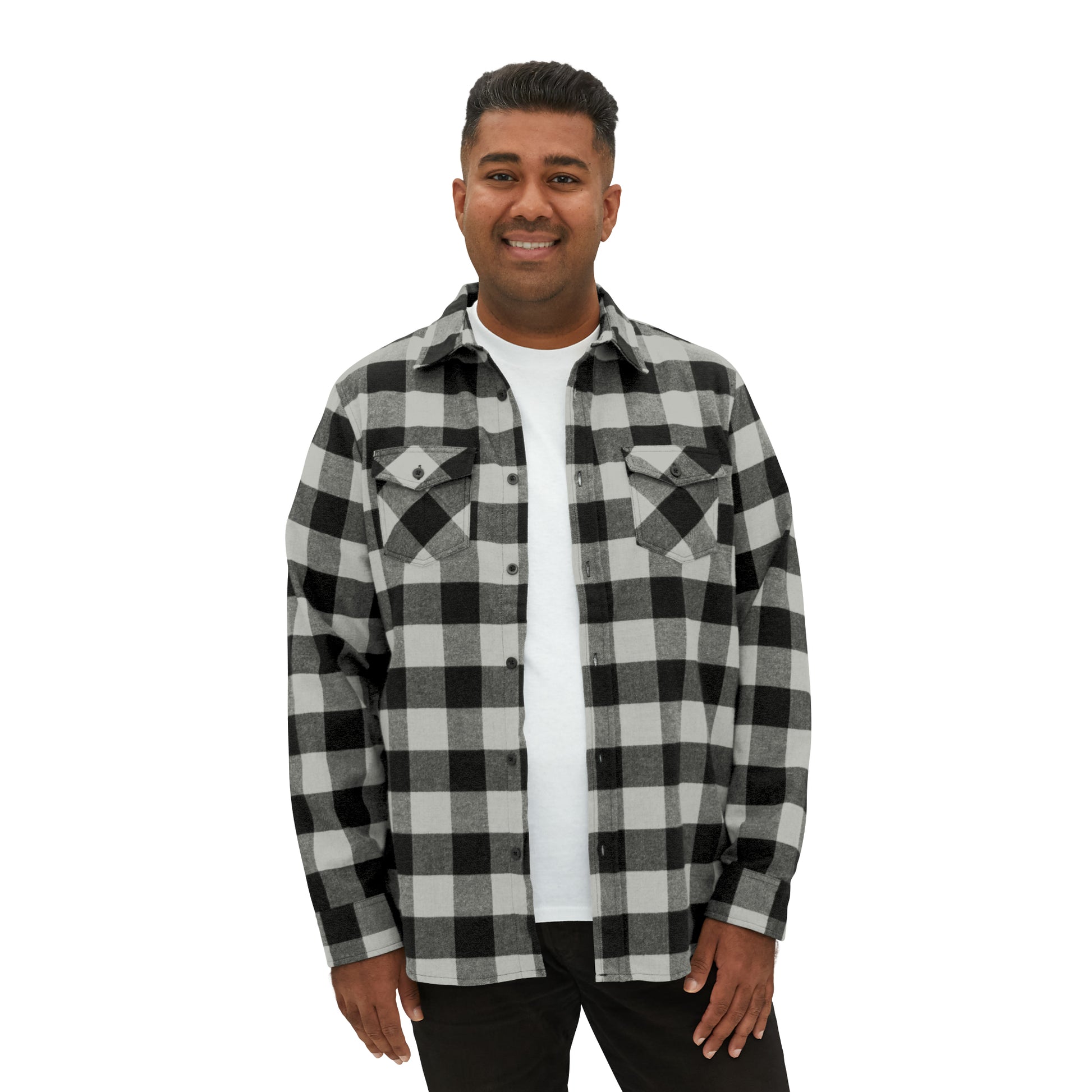 A man wearing a Printify Unisex Flannel Shirt in black and white.