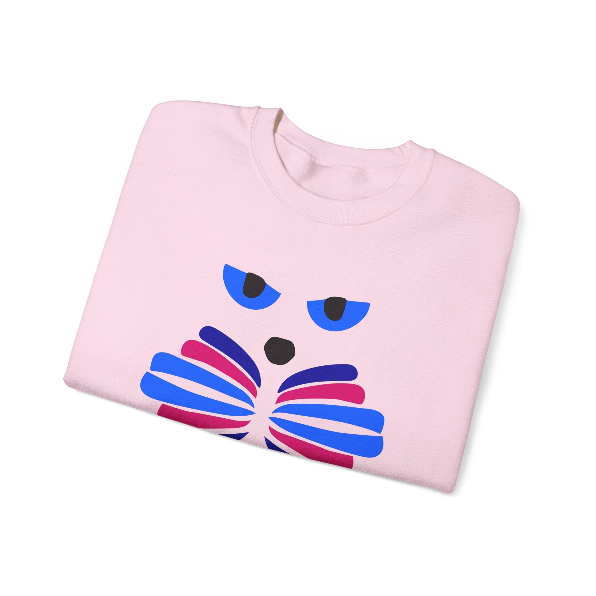 The Whimsical Cat Graphic Sweatshirt by Printify features a stylized cat face with blue and pink accents, adding an artistic flair to your cozy, unisex crewneck collection.