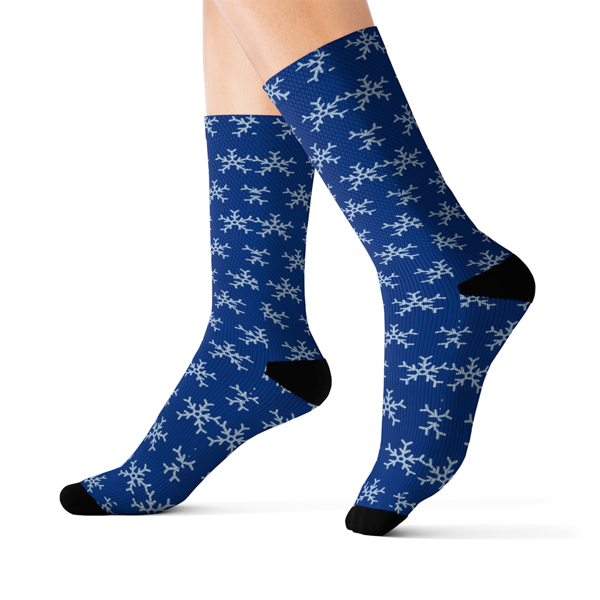 A pair of Printify blue tube socks with snowflakes on them.