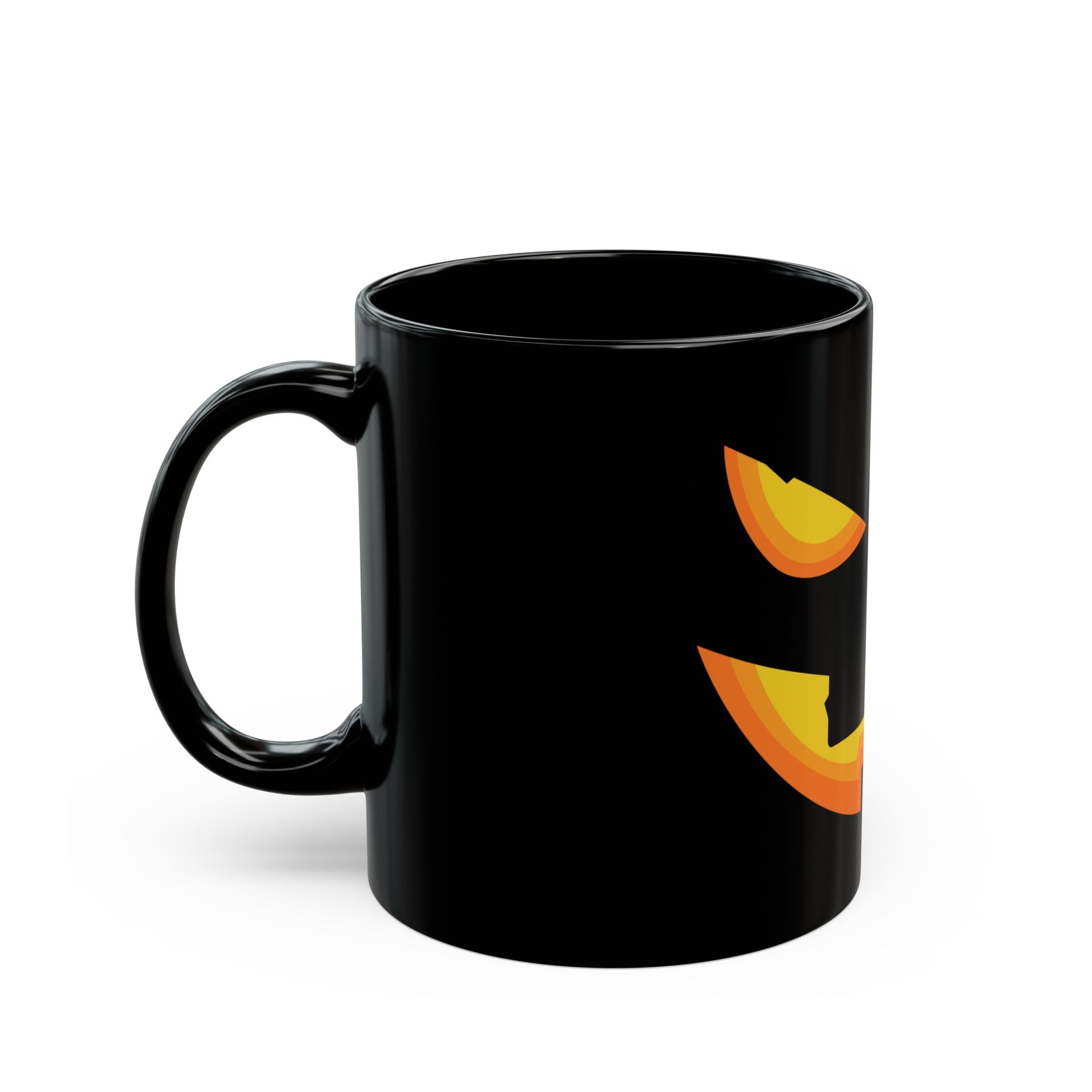 Enjoy your spooky season sips with the Printify Halloween Pumpkin Face Mug—a black ceramic mug featuring a bold orange and yellow jack-o'-lantern design, perfect for festive Halloween vibes.