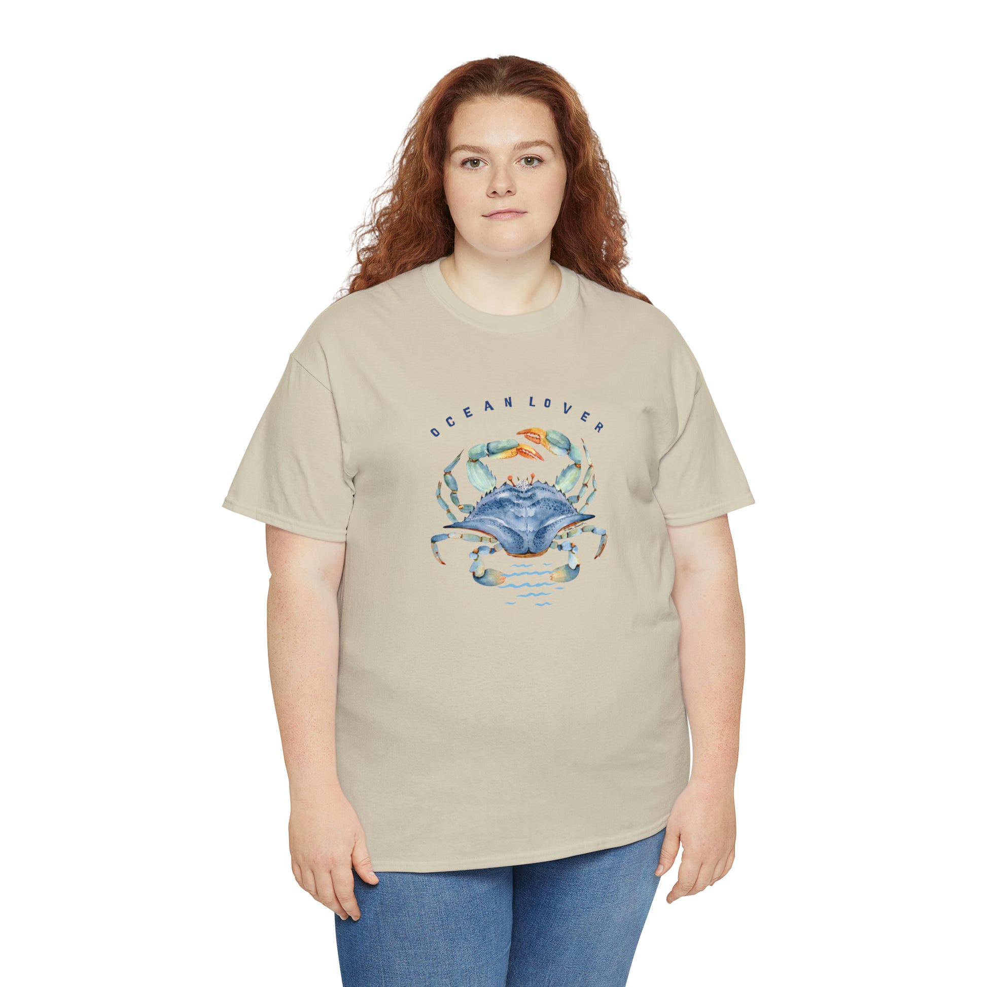 Plus size woman with auburn-colored hair wearing the Sand colored shirt