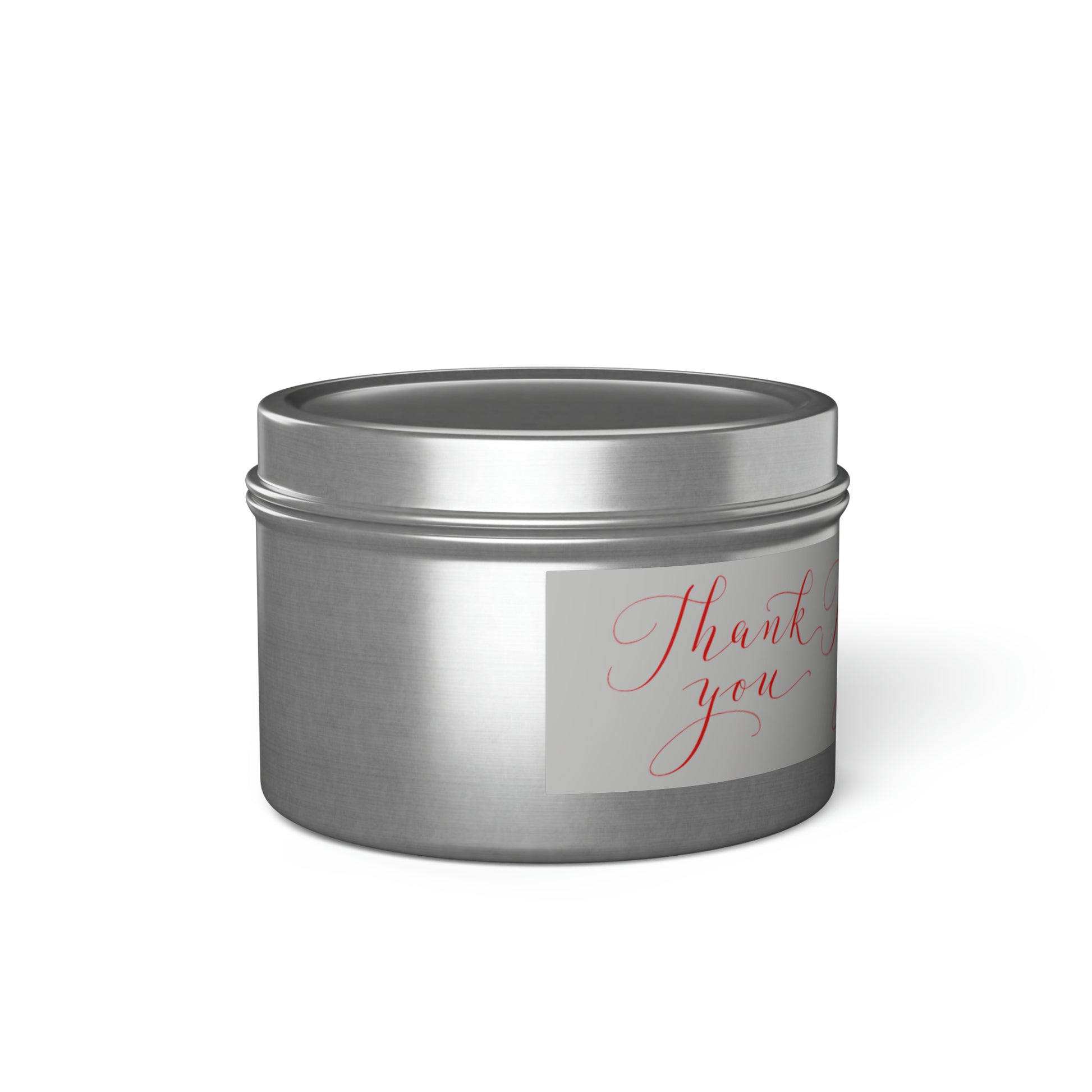A silver tin filled with a Printify Scented Tin Candle: 4 oz.; 2 fragrances; Silver; Thank you.