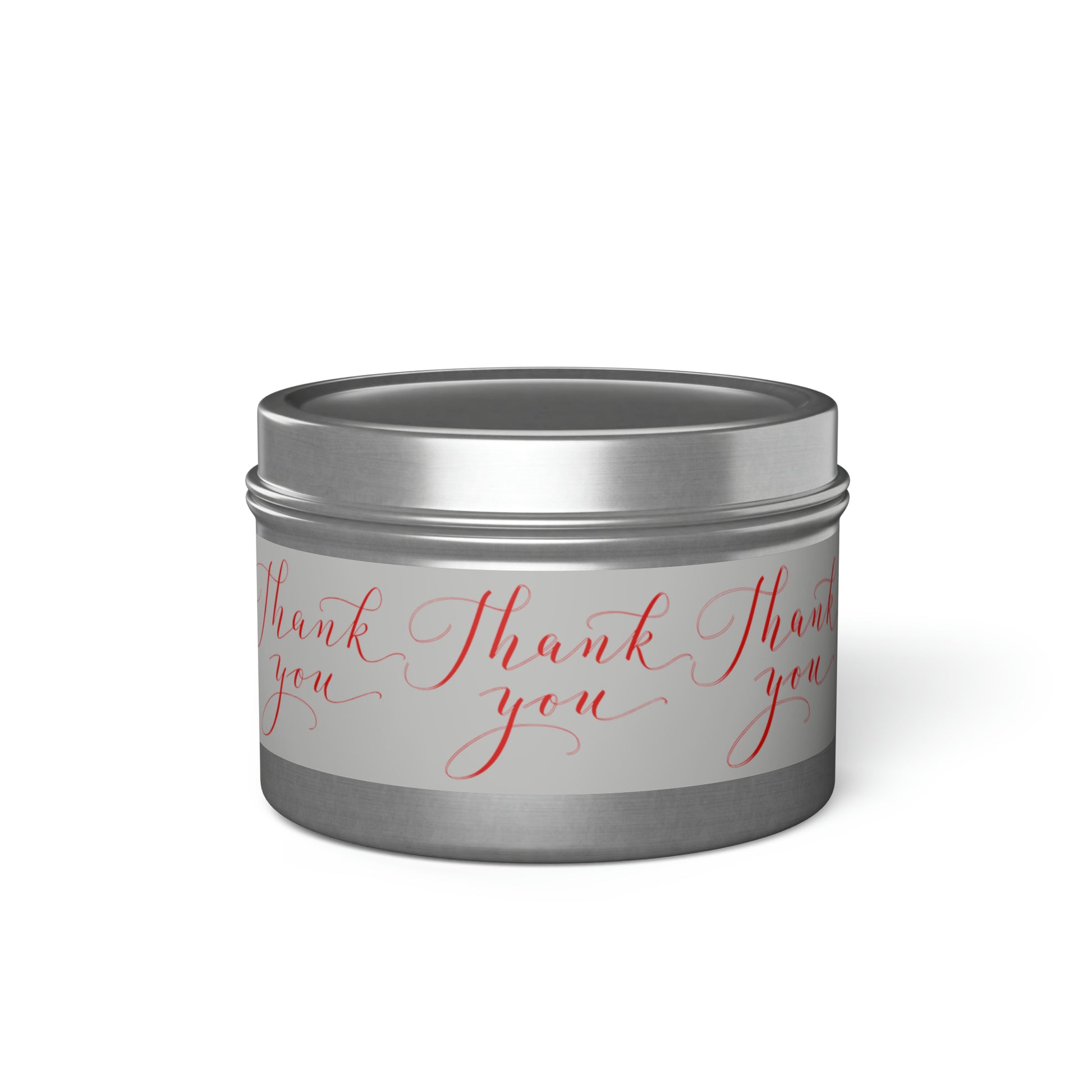 A Printify scented tin candle with the words thank you written on it.
